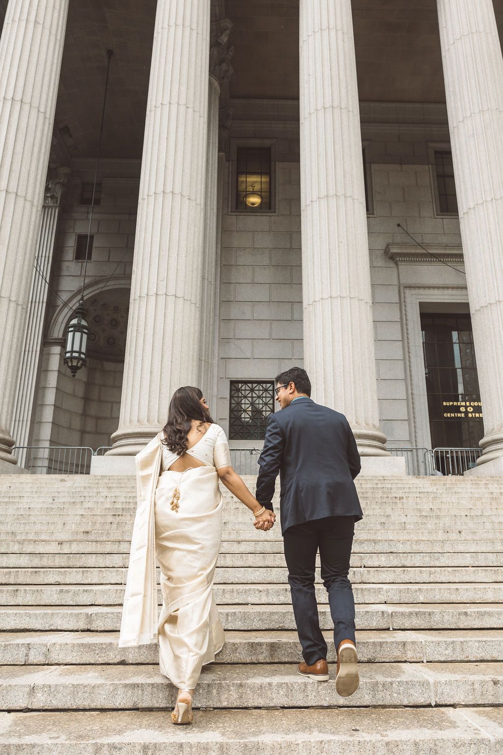 couple holding hands during their photoshoot