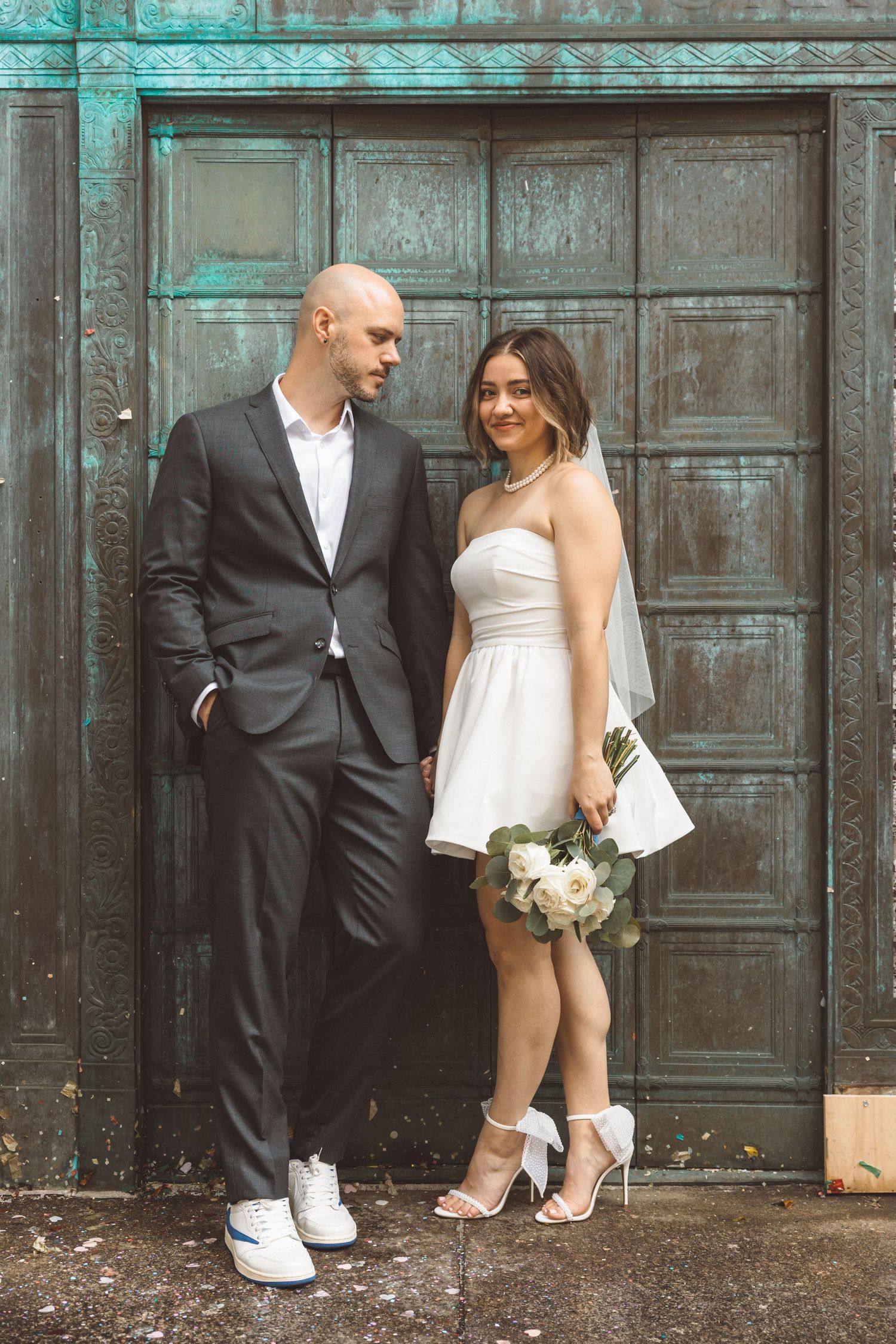 Bride and groom, smiling at each other