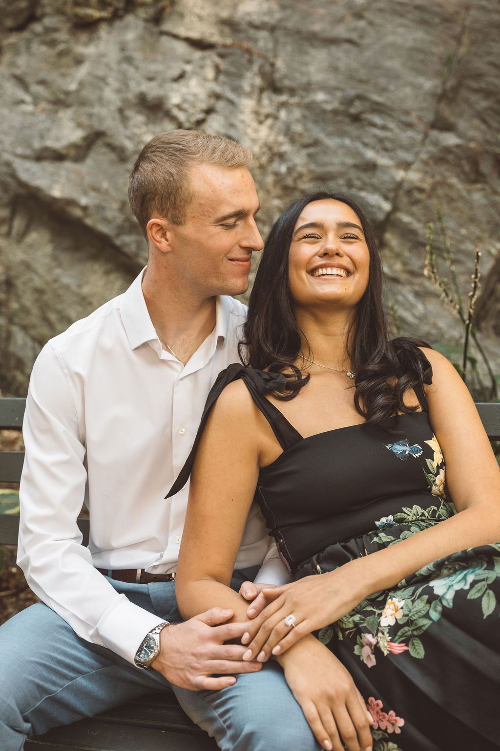 fiance kissing his fiance on the cheek