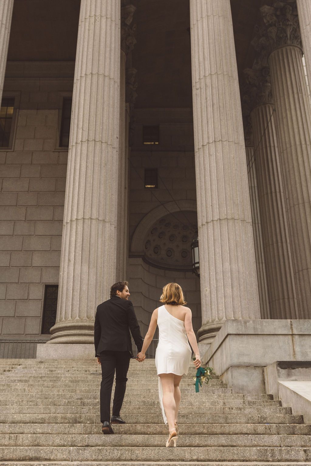 couple holding hands during their session