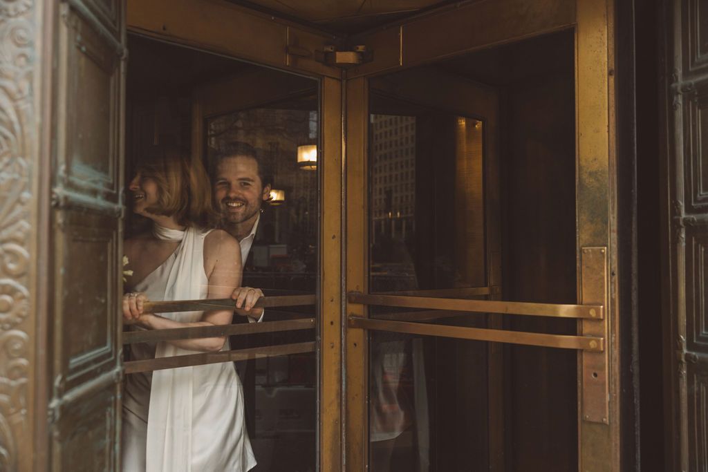 cute picture of the newlyweds laughing with each other