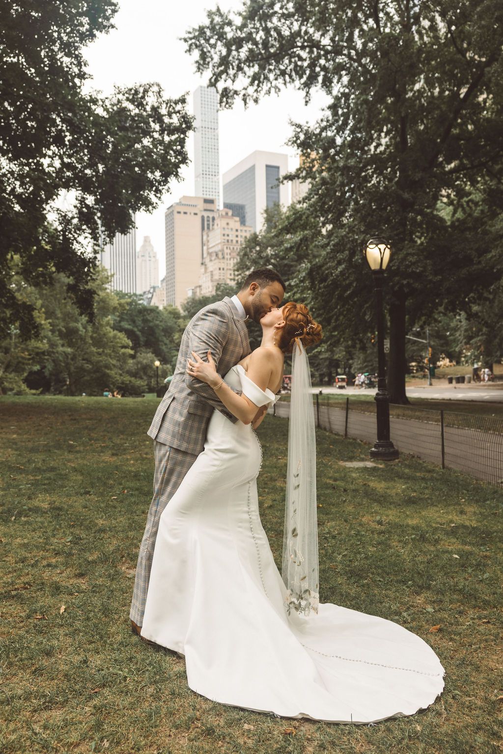 cute portrait of the newlyweds kissing