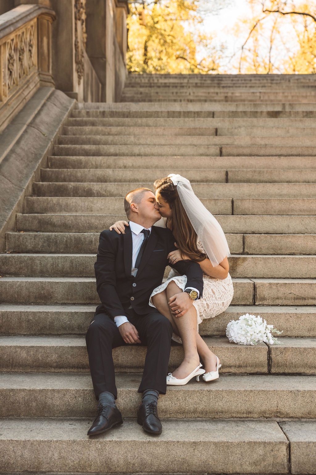 cute portrait of the newlyweds kissing