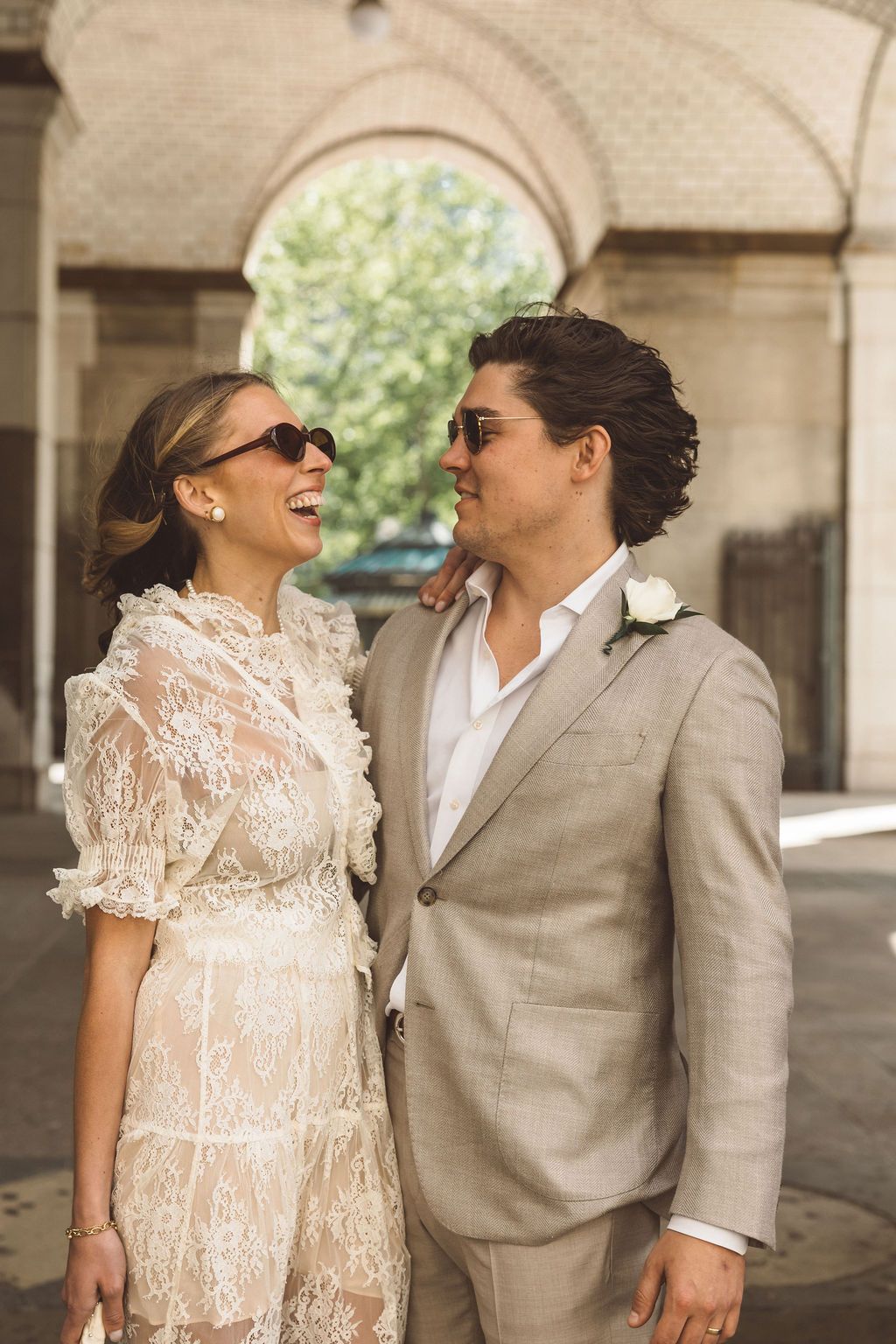 cute picture of the bride and groom smiling at each other