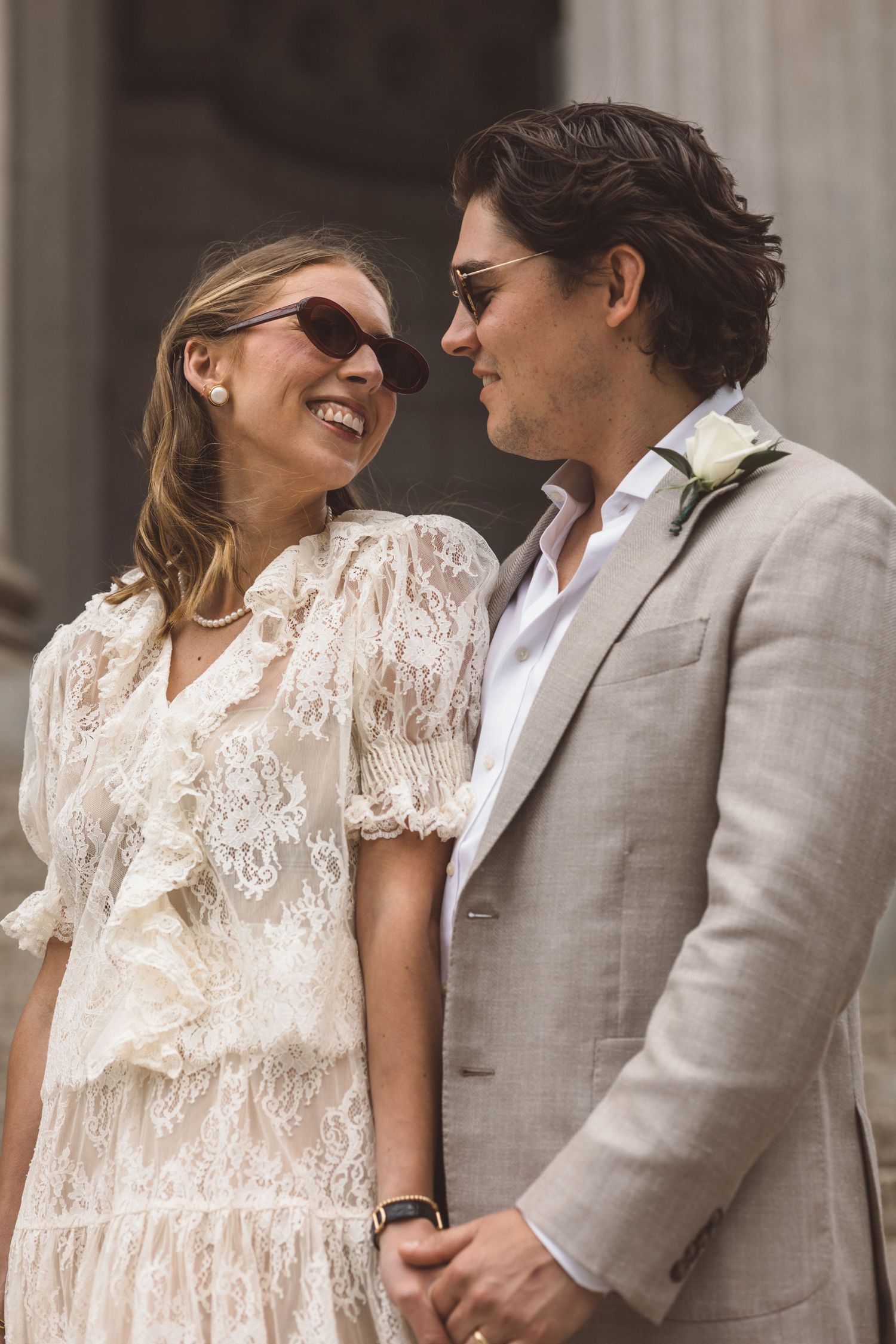 cute picture of the bride and groom smiling at each other