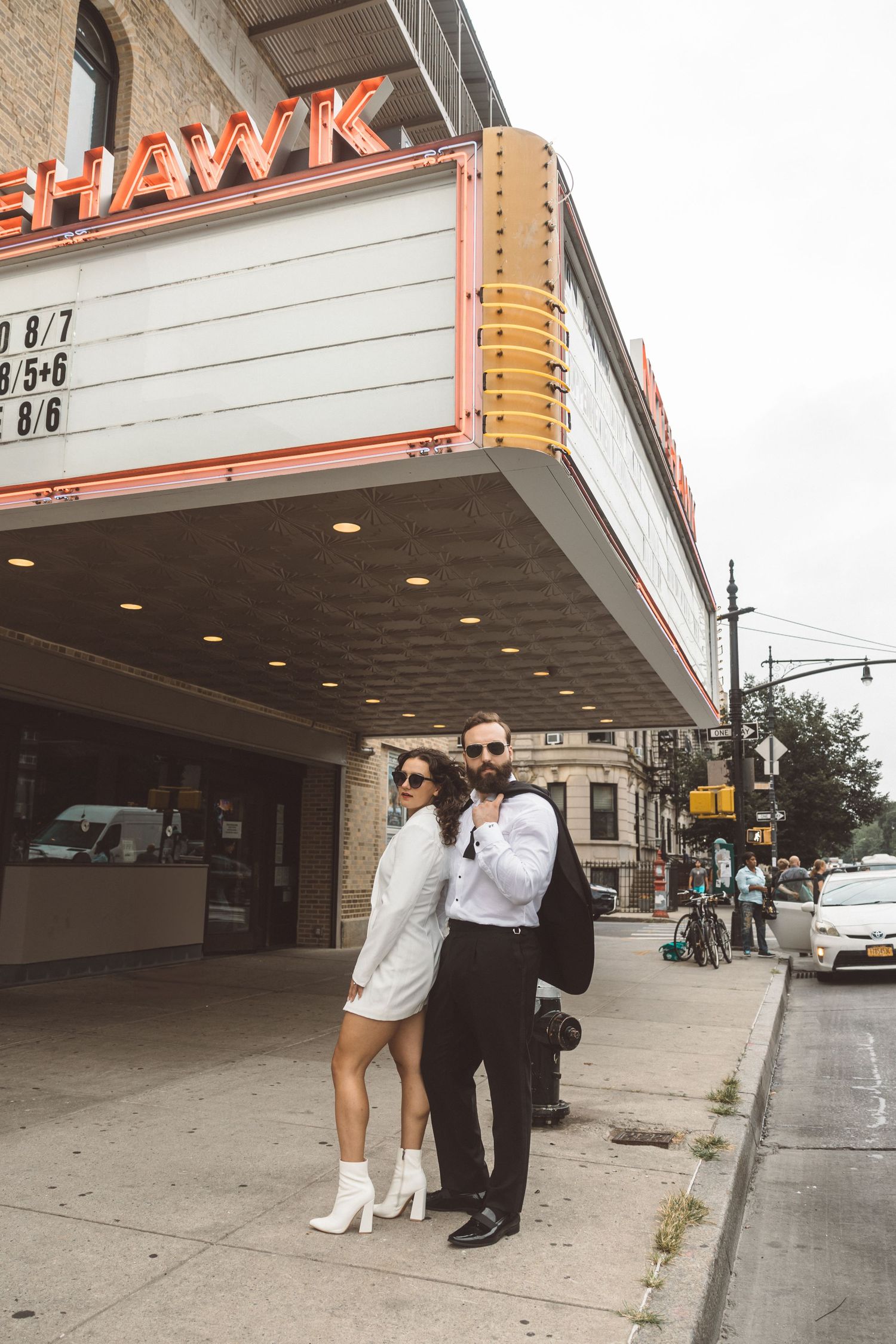 cute picture of the newly engaged couple posing for the camera during their engagement session