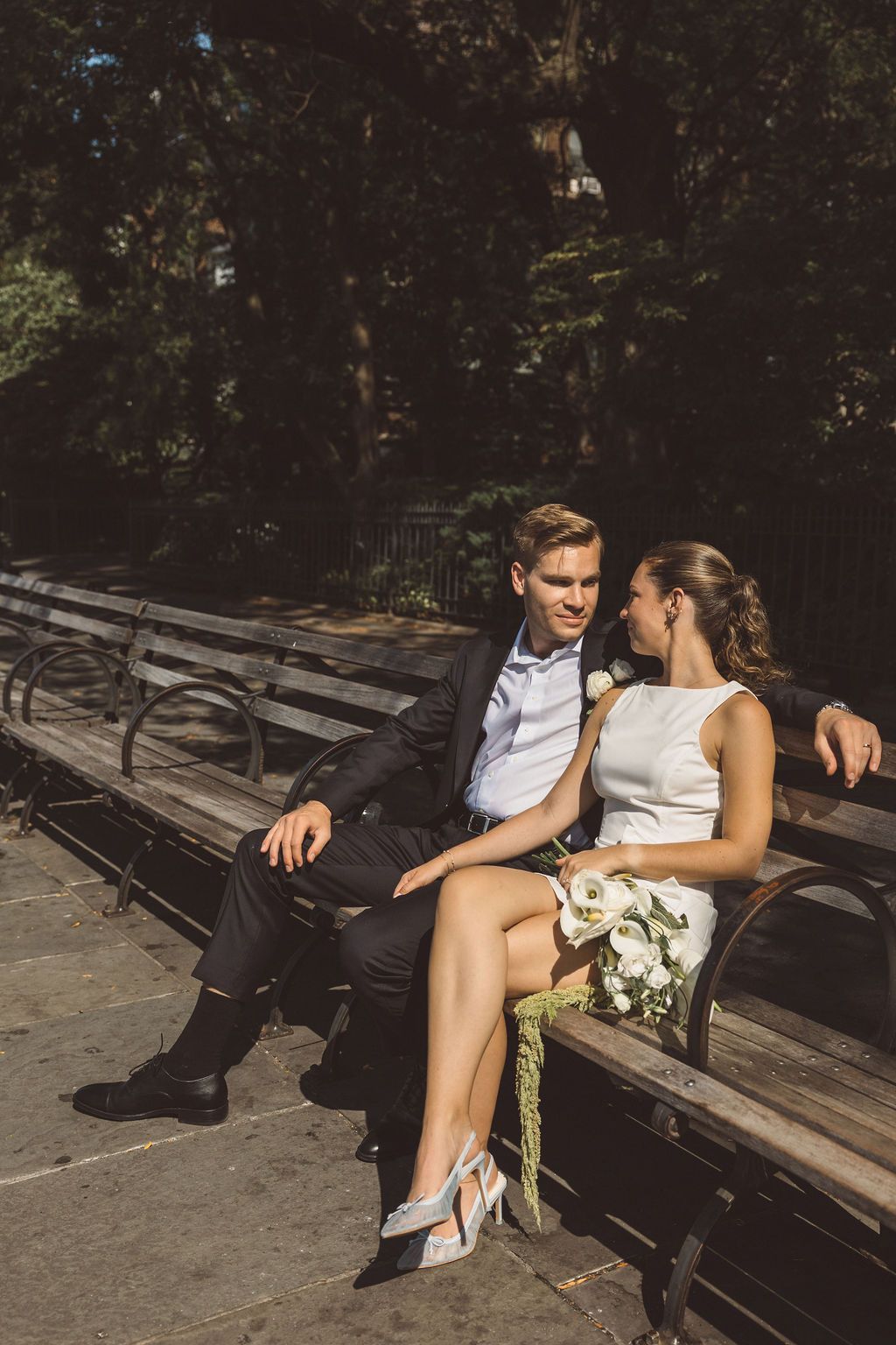cute picture of the newlyweds smiling at each other