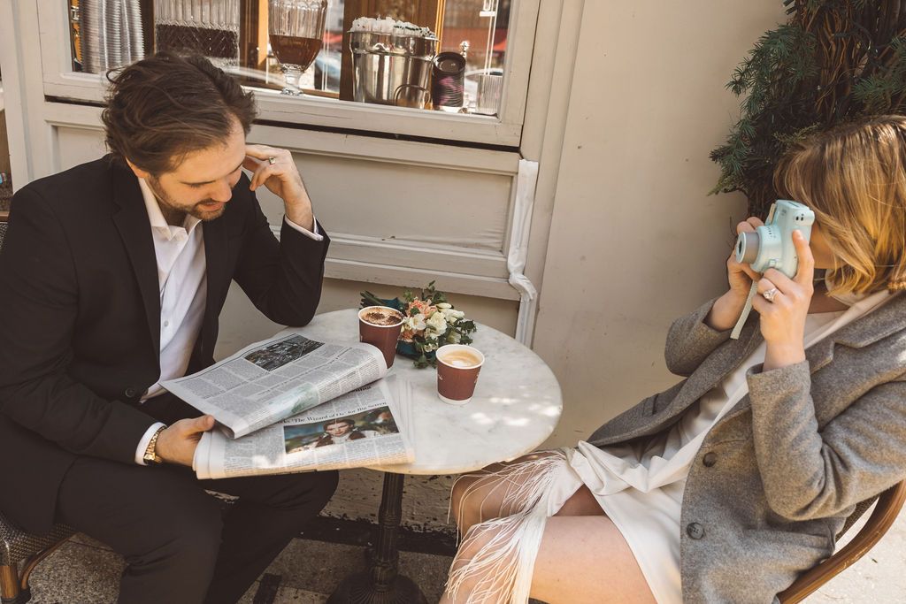 couple celebrating their elopement with coffee