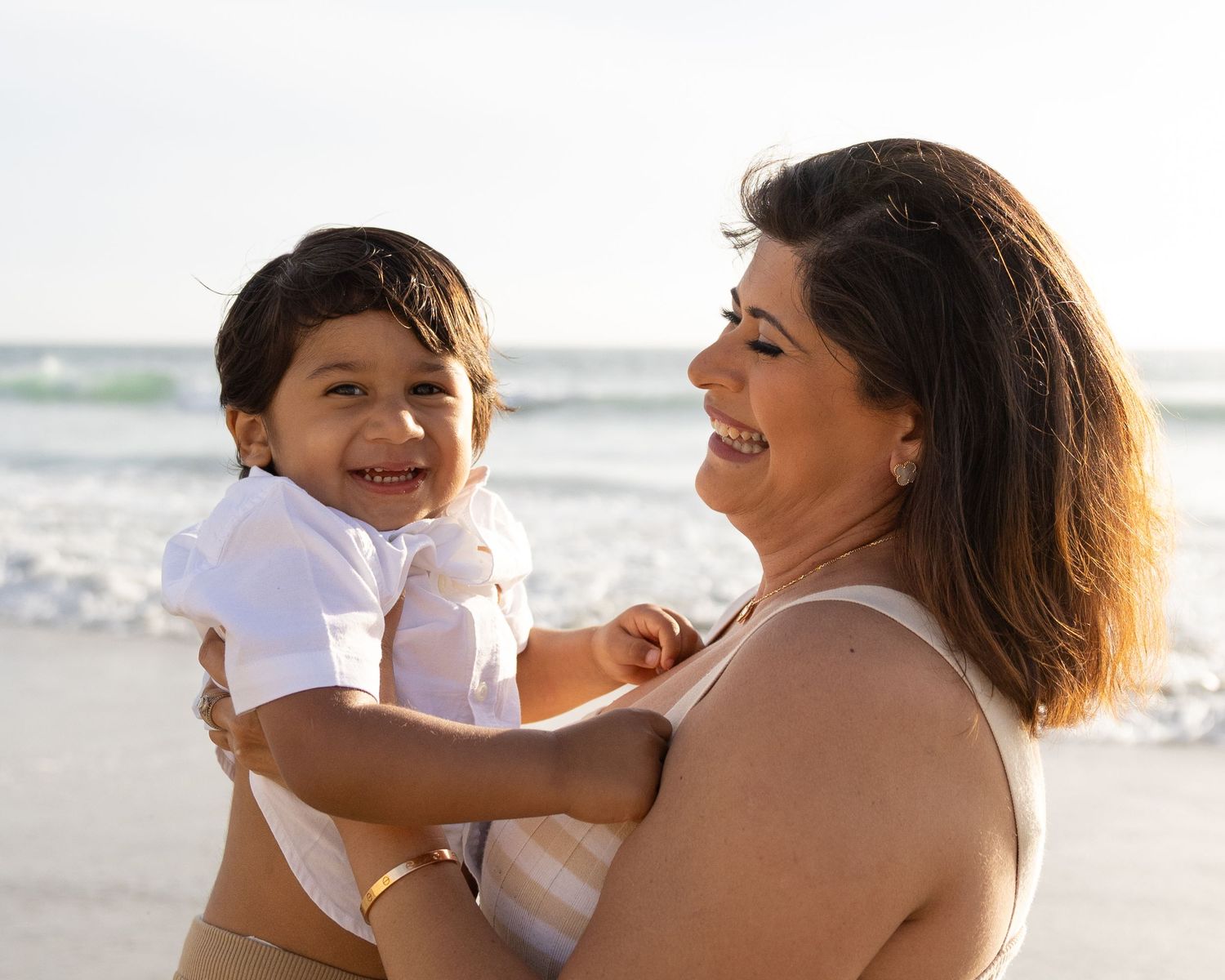 mom and son playing at Del Mar beachSan Diego Family and Wedding photographer. San Diego Event Photography. Families and toddlers  Elopement