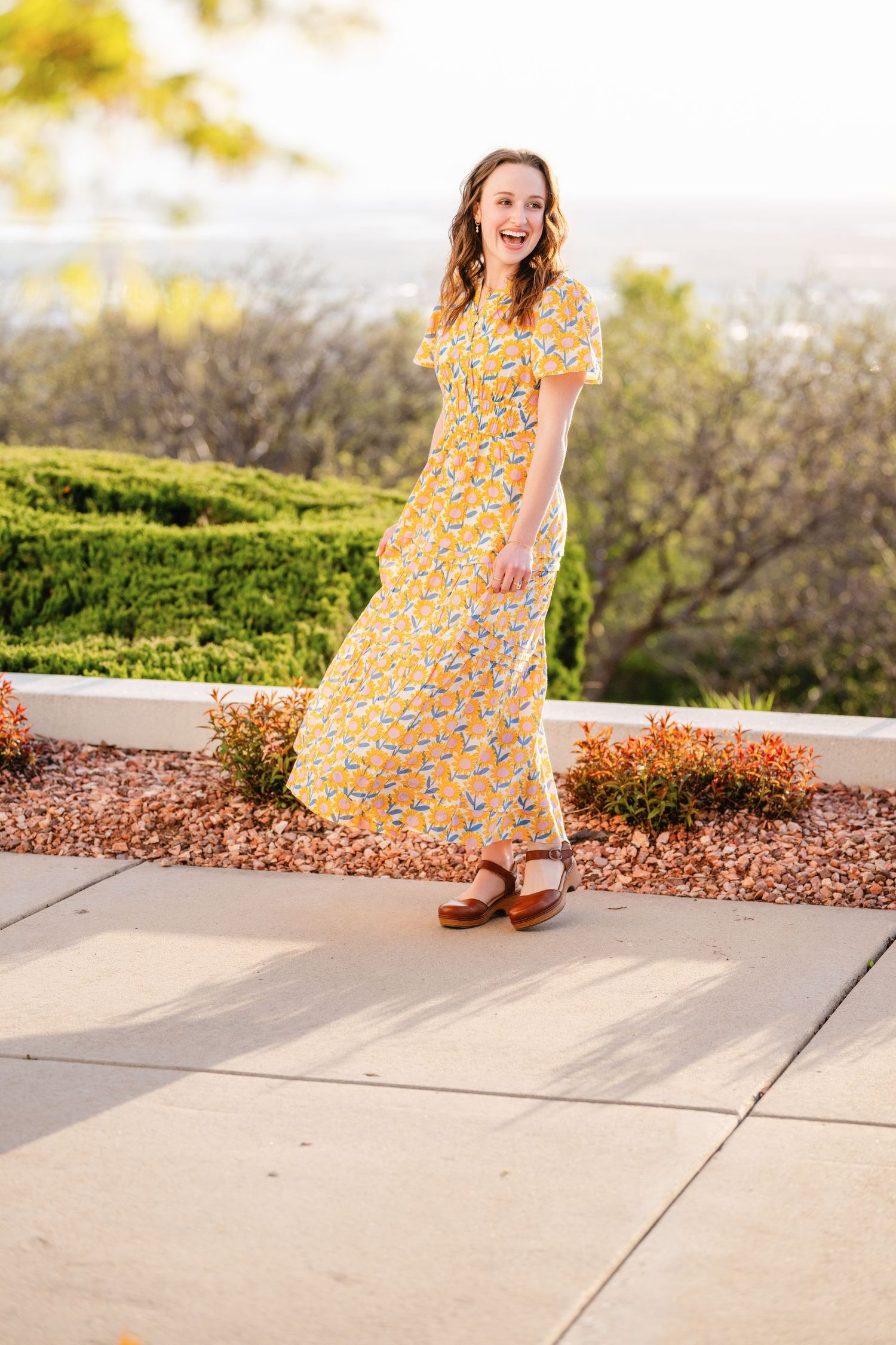 LDS missionary portrait in Utah of young woman in yellow dress with soft light and natural setting - Bountiful Utah