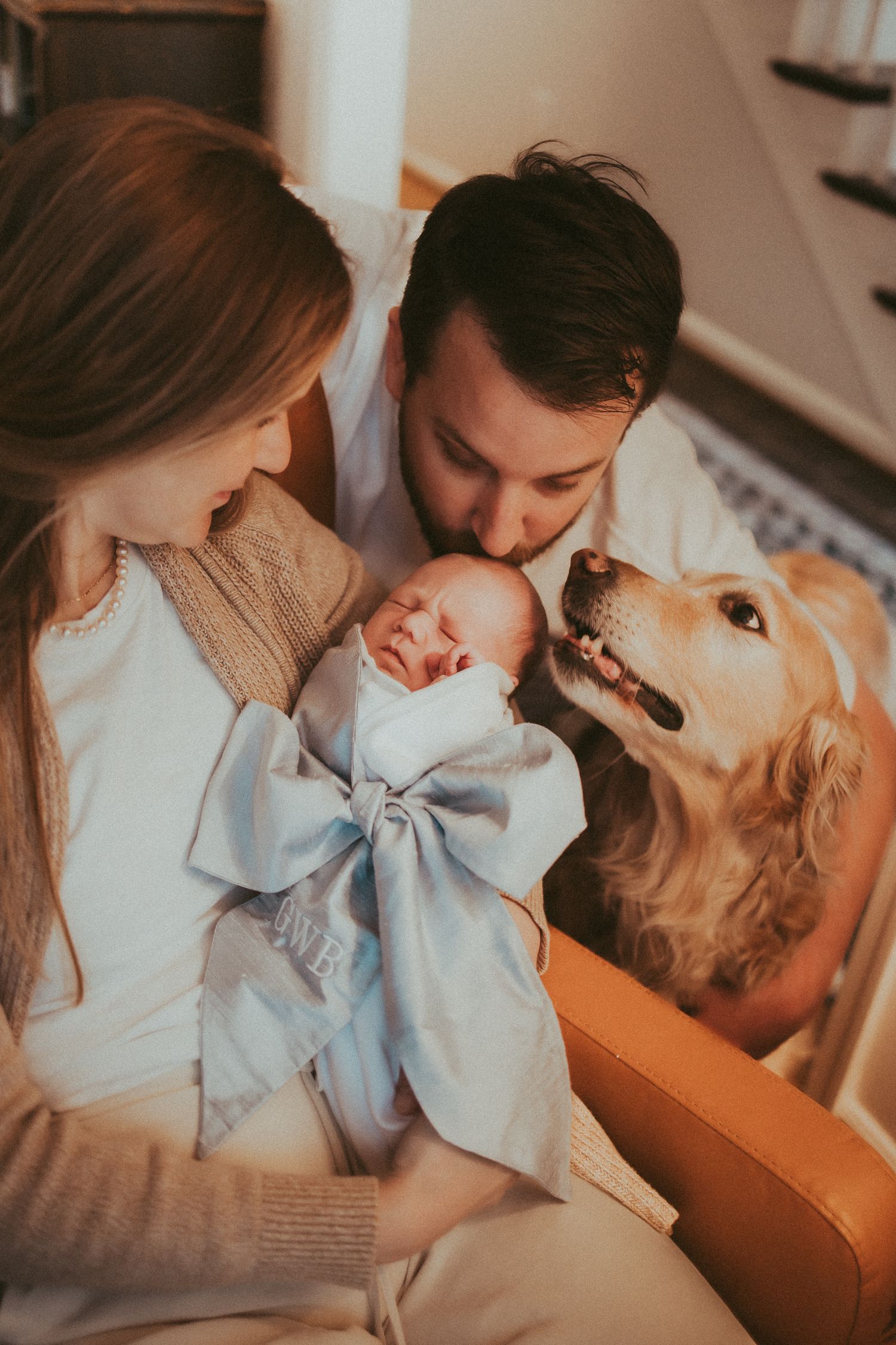 A series of intimate photos showing tender moments between parents and their newborn baby in warm lighting.