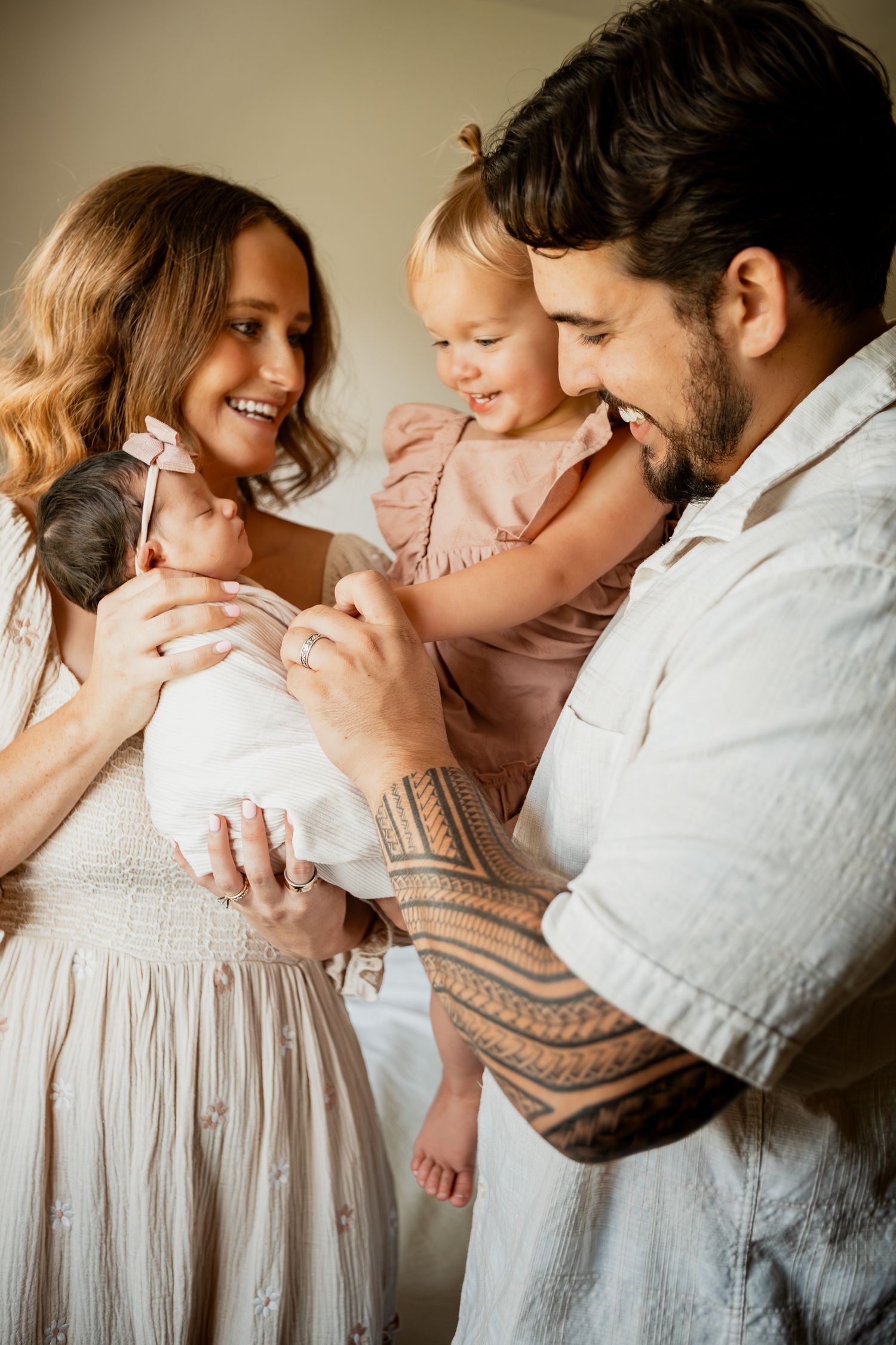 Romantic collection of intimate family photos showing tender moments with parents and baby in soft natural lighting.