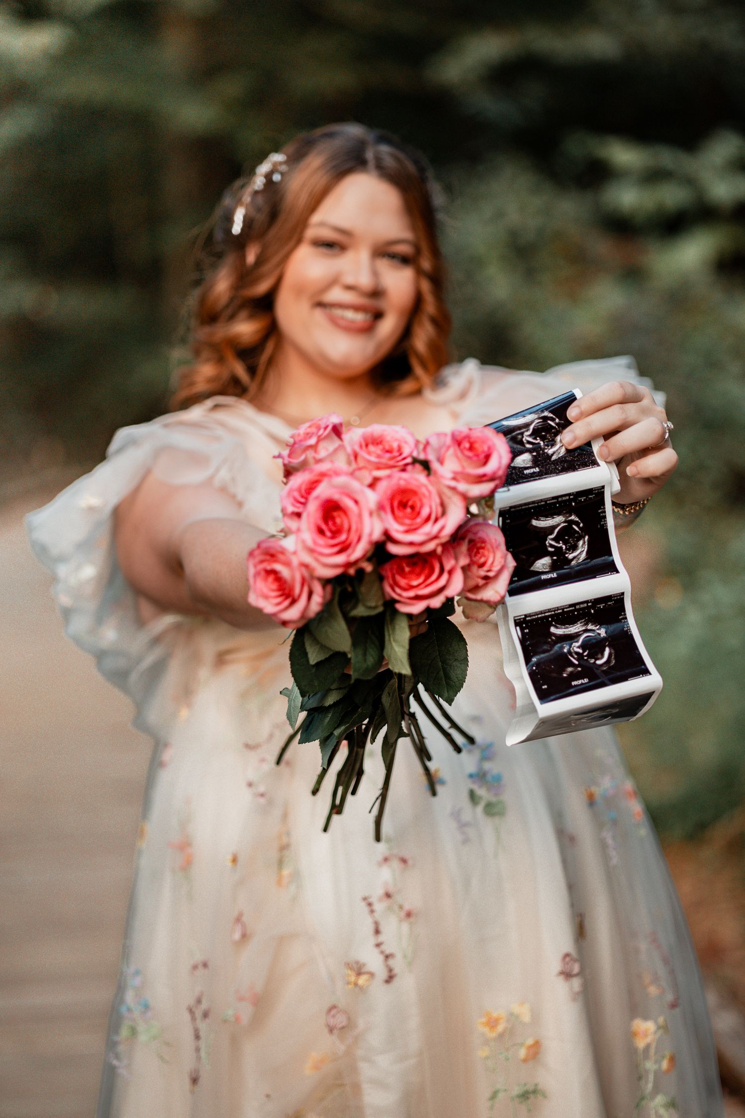 A person in a floral dress holds pink roses and ultrasound photos in a pregnancy announcement photo series.