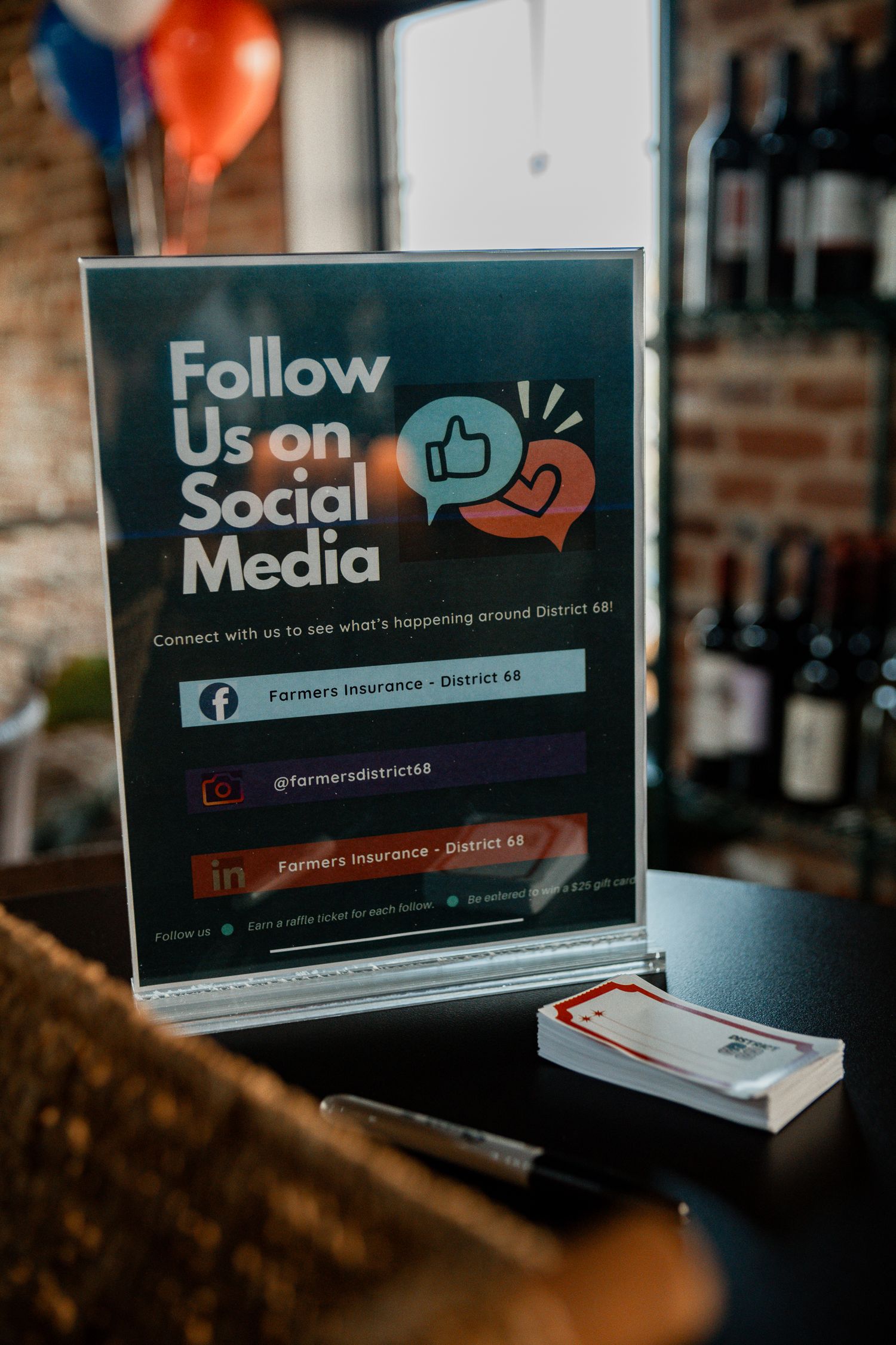 Social media promotional materials displayed with follow buttons and branding elements.