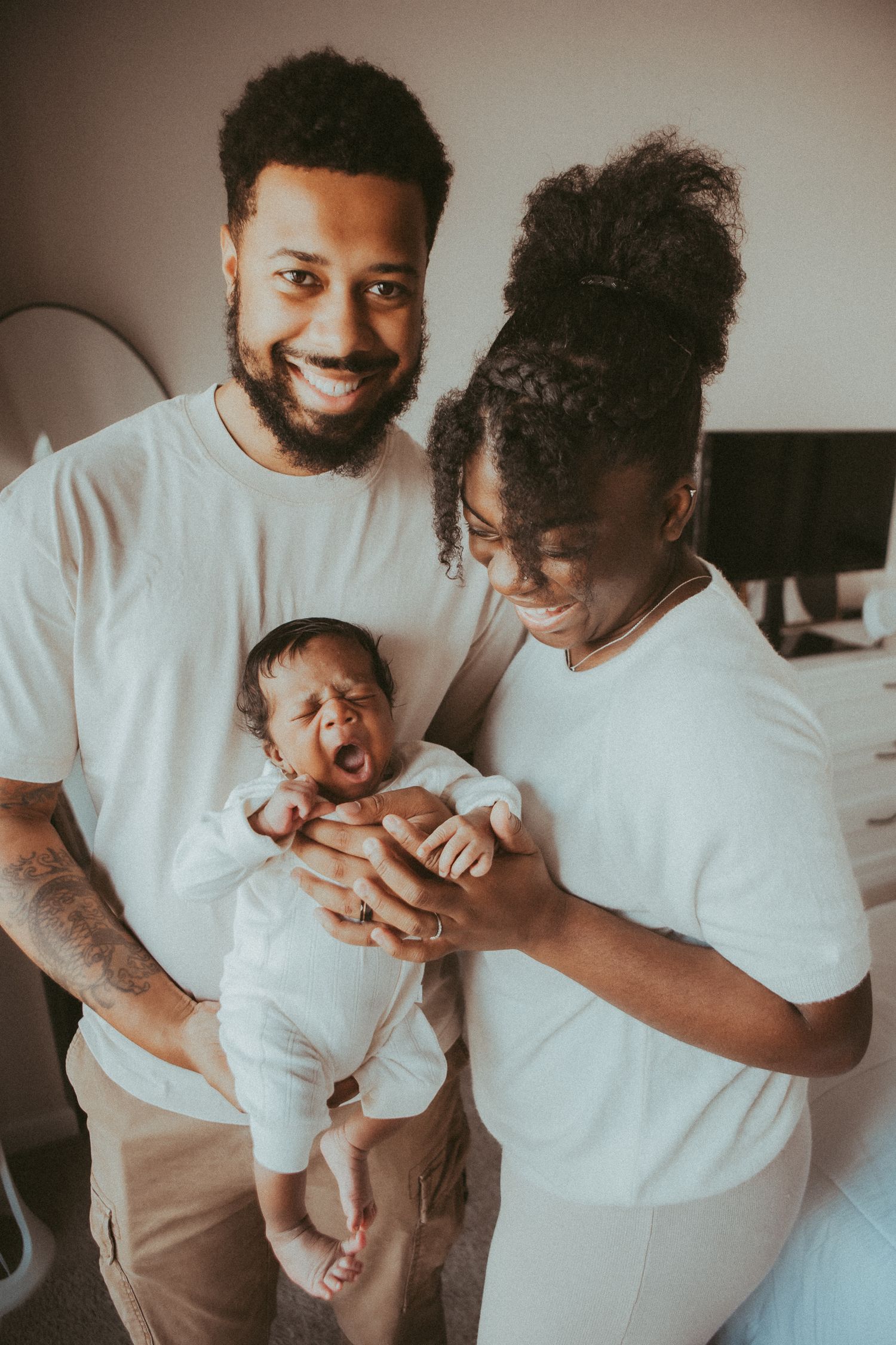 A loving family moment captured in a series of candid photos showing joyful interactions with a small baby.
