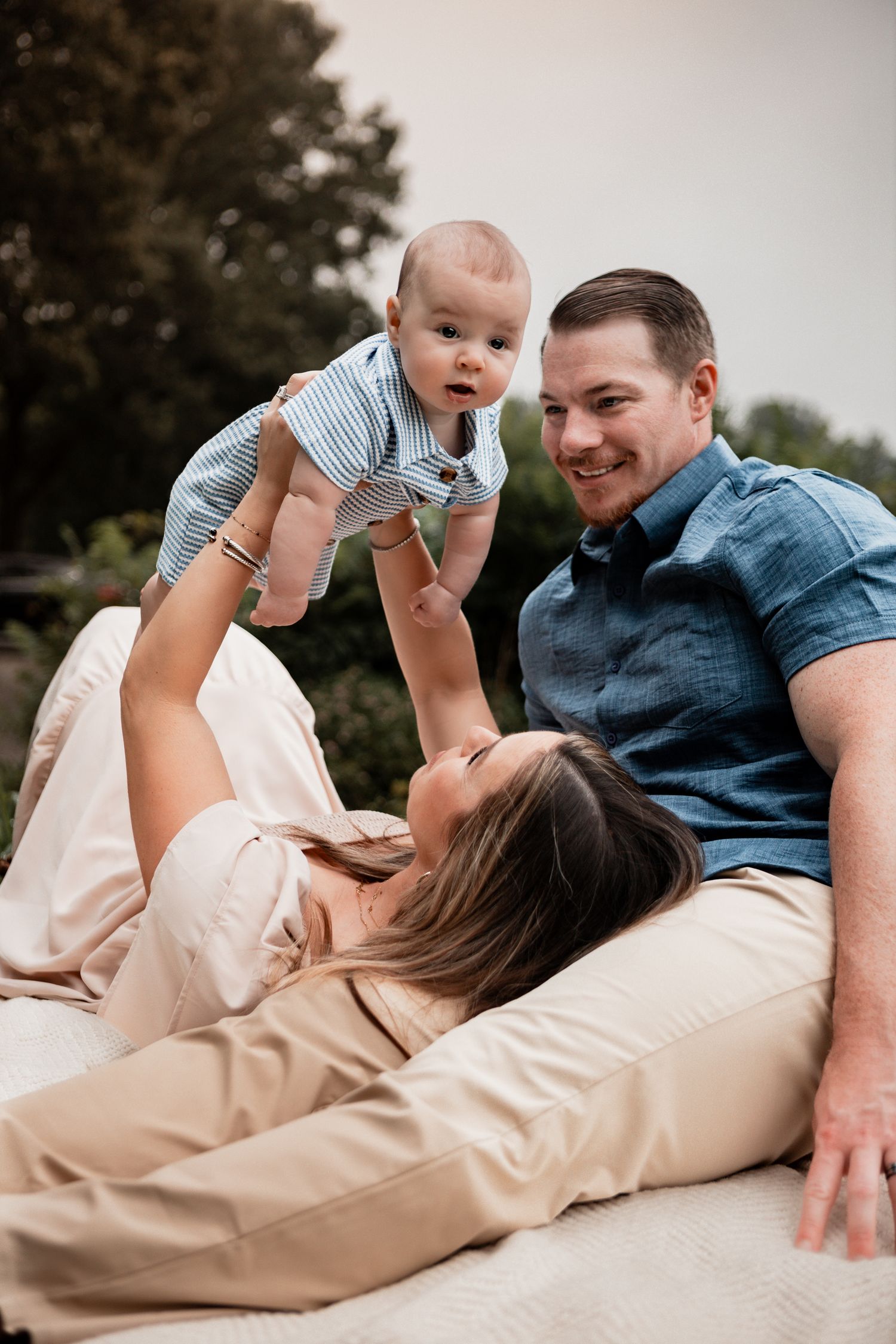 Candid family photo sequence showing playful moments on light background.