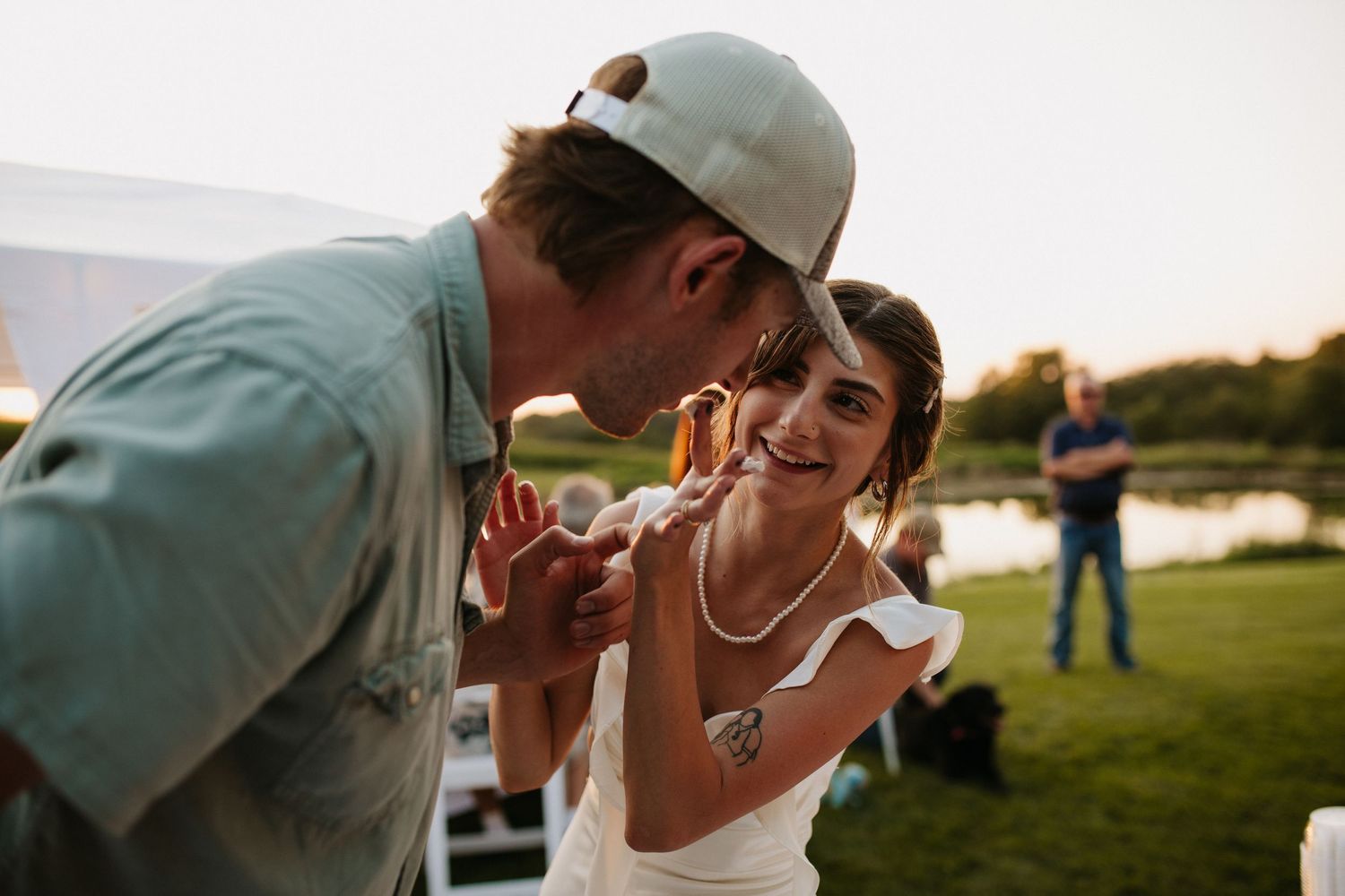 Candid moments of celebration and laughter at an outdoor wedding reception.