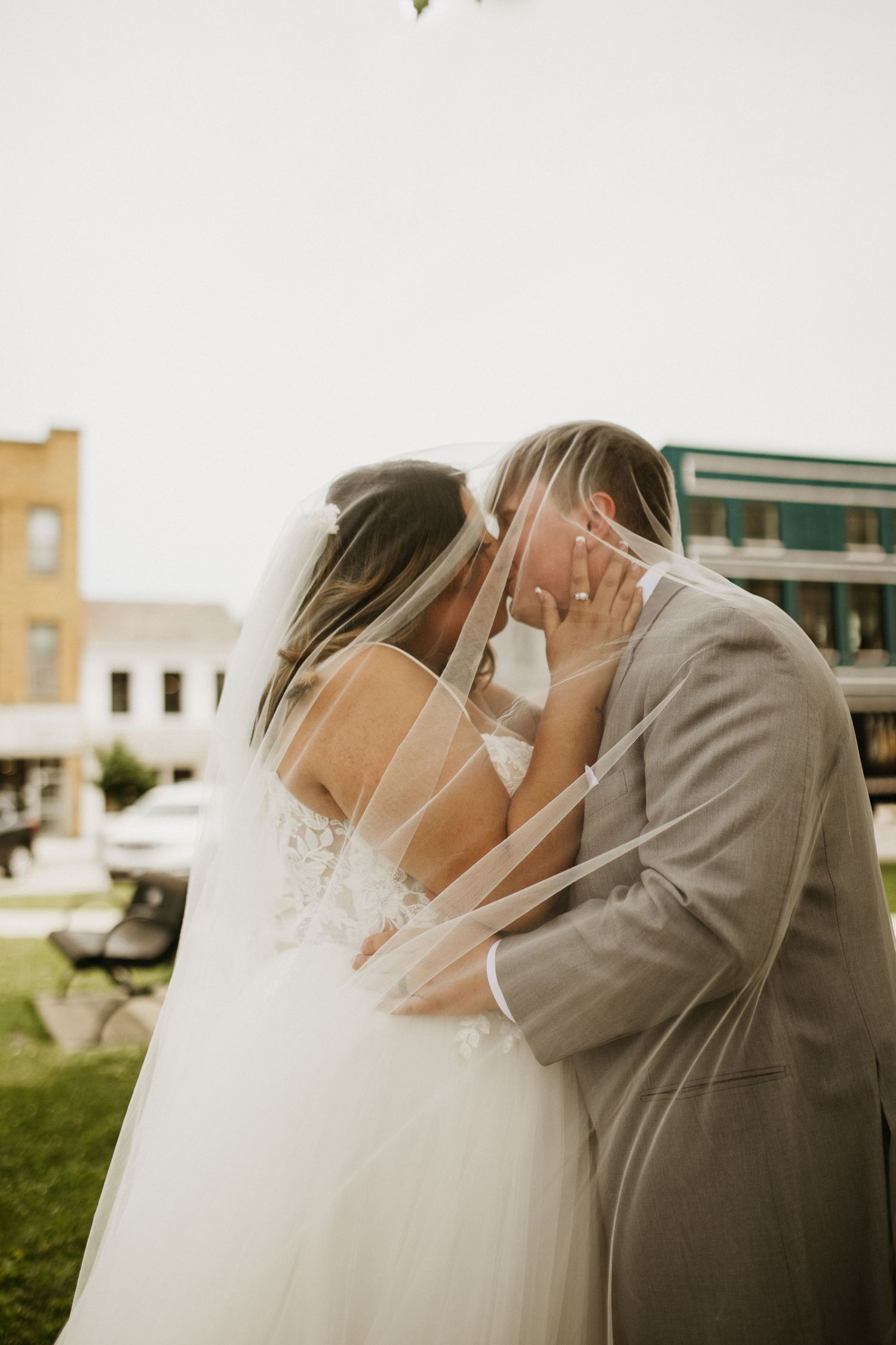 A series of romantic wedding photos showing tender moments between newlyweds outdoors.
