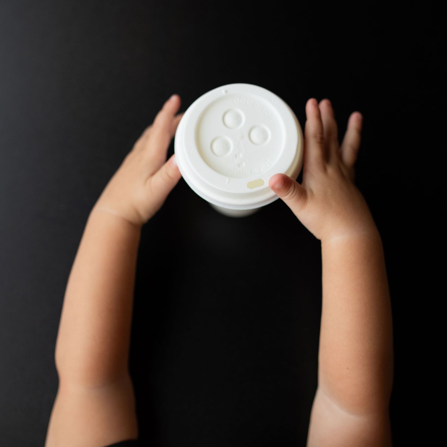 coffee branding, toddler grabbing a drink