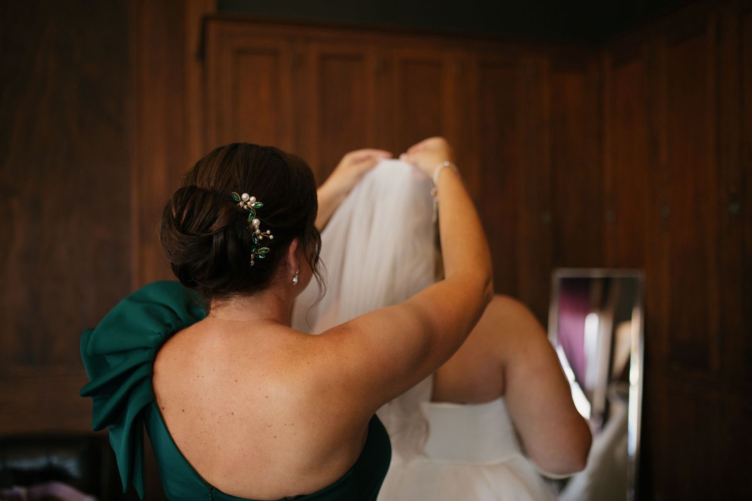 Intimate dance moments captured during an indoor wedding reception.