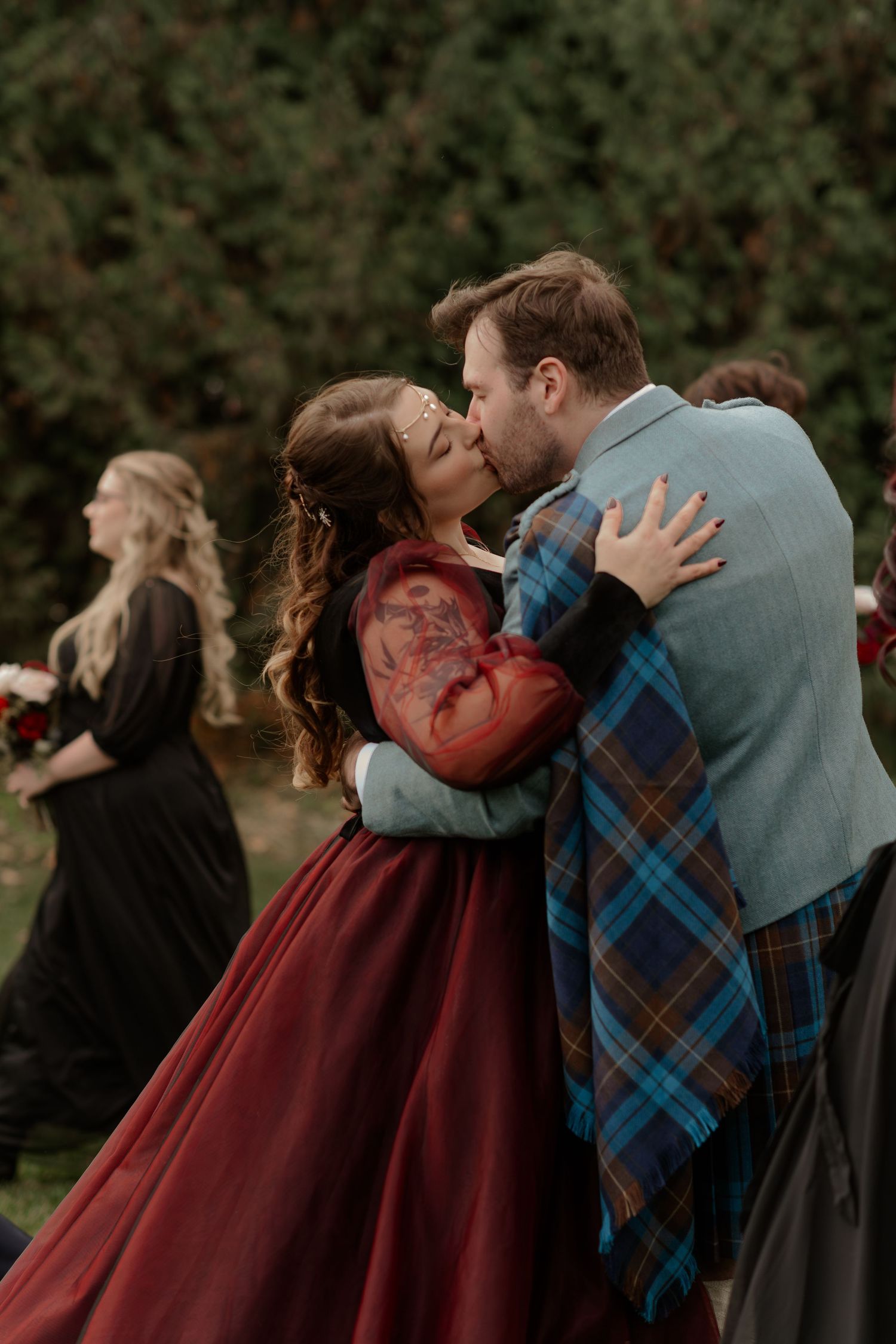 A romantic moment captured in a series of progressive frames showing a couple embracing outdoors.
