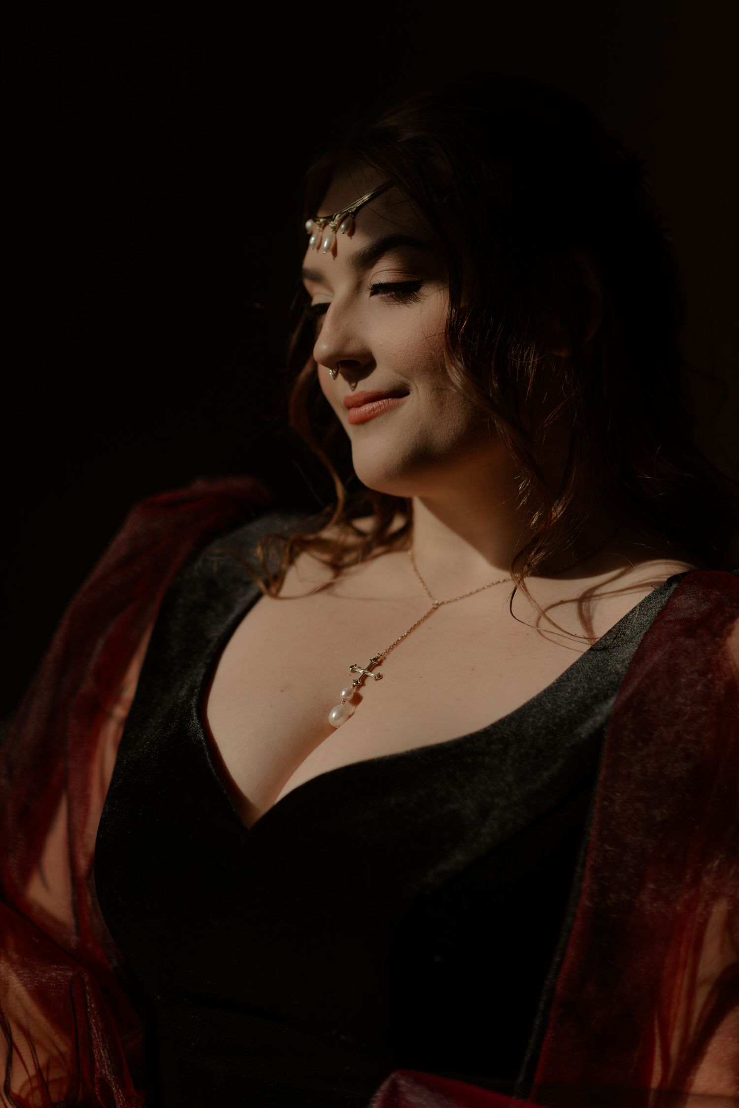 Artistic portrait series showing close-up details of a dark moody fashion shoot with burgundy and black tones.