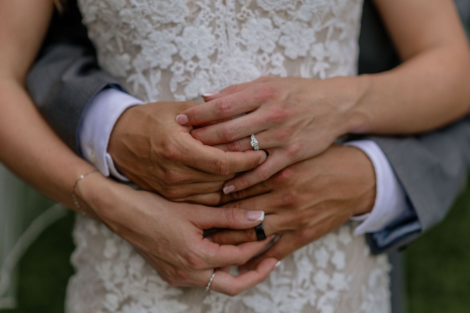 Close-up shots of hands with wedding rings showing intimate moments between newlyweds.