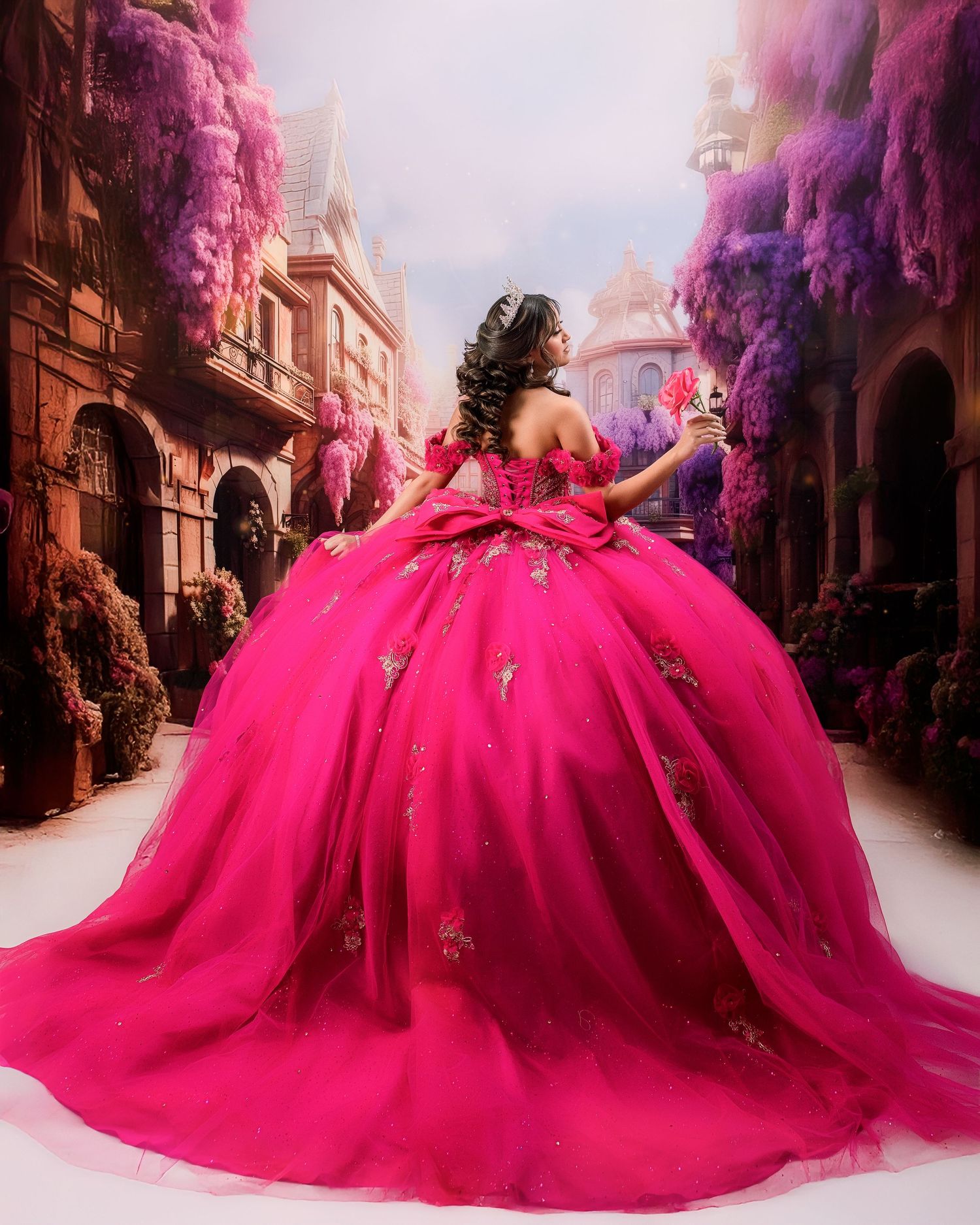 Girl in a voluminous hot pink ball gown with gold embroidery poses on a fairytale street lined with purple flowers. Sweet 16 photography