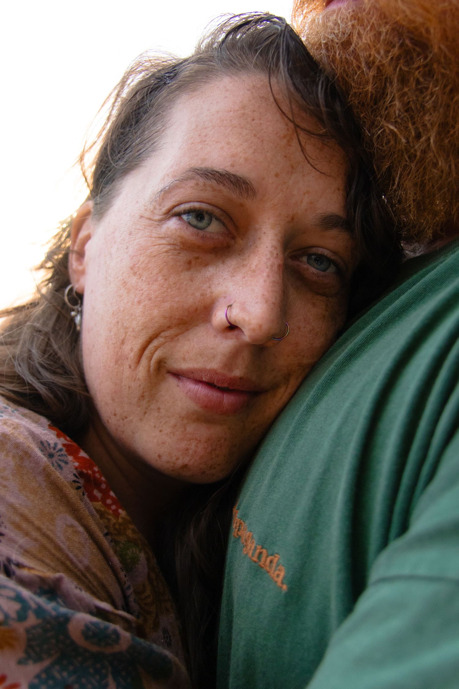 woman resting her head on her husbands chest