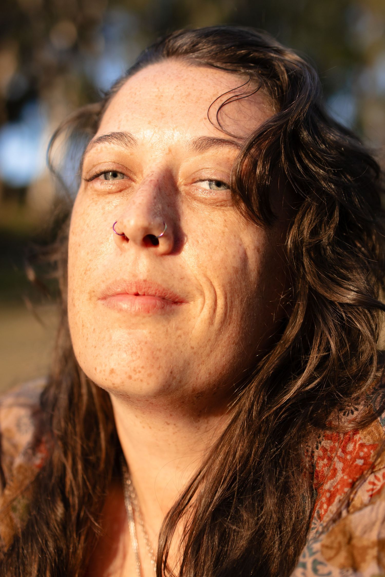 portrait of a woman with the sunshining on her face
