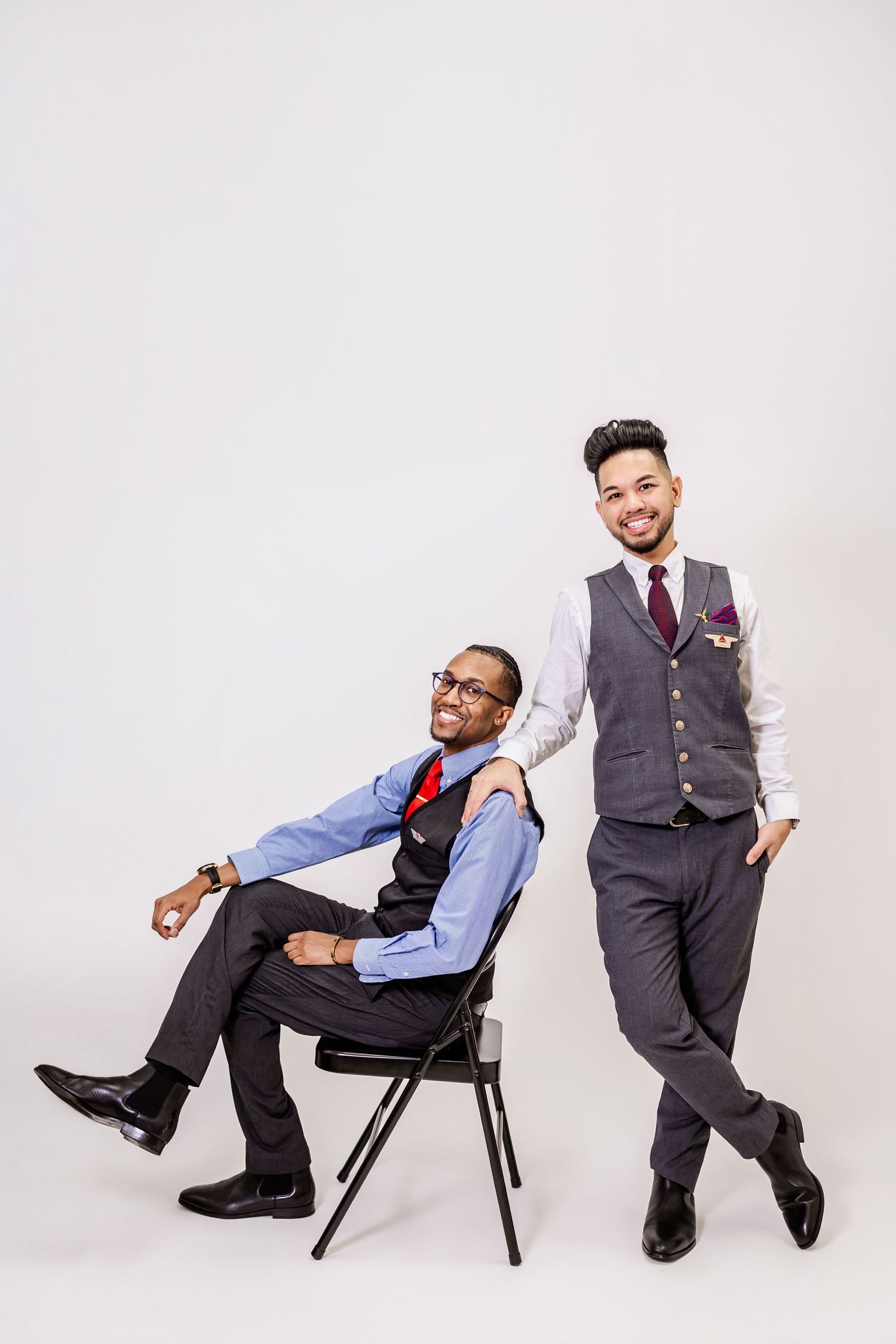 Professional photo series showing stylish business attire poses with chairs against white background.
