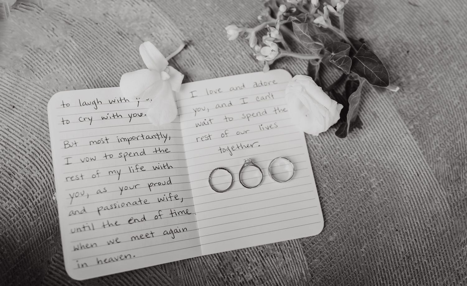 Handwritten wedding vows or notes on lined paper in black and white.