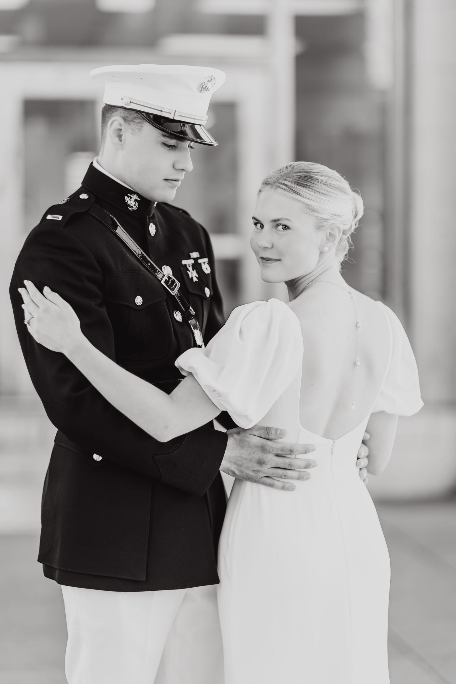 A black and white photo sequence showing a couple dancing together in formal attire.