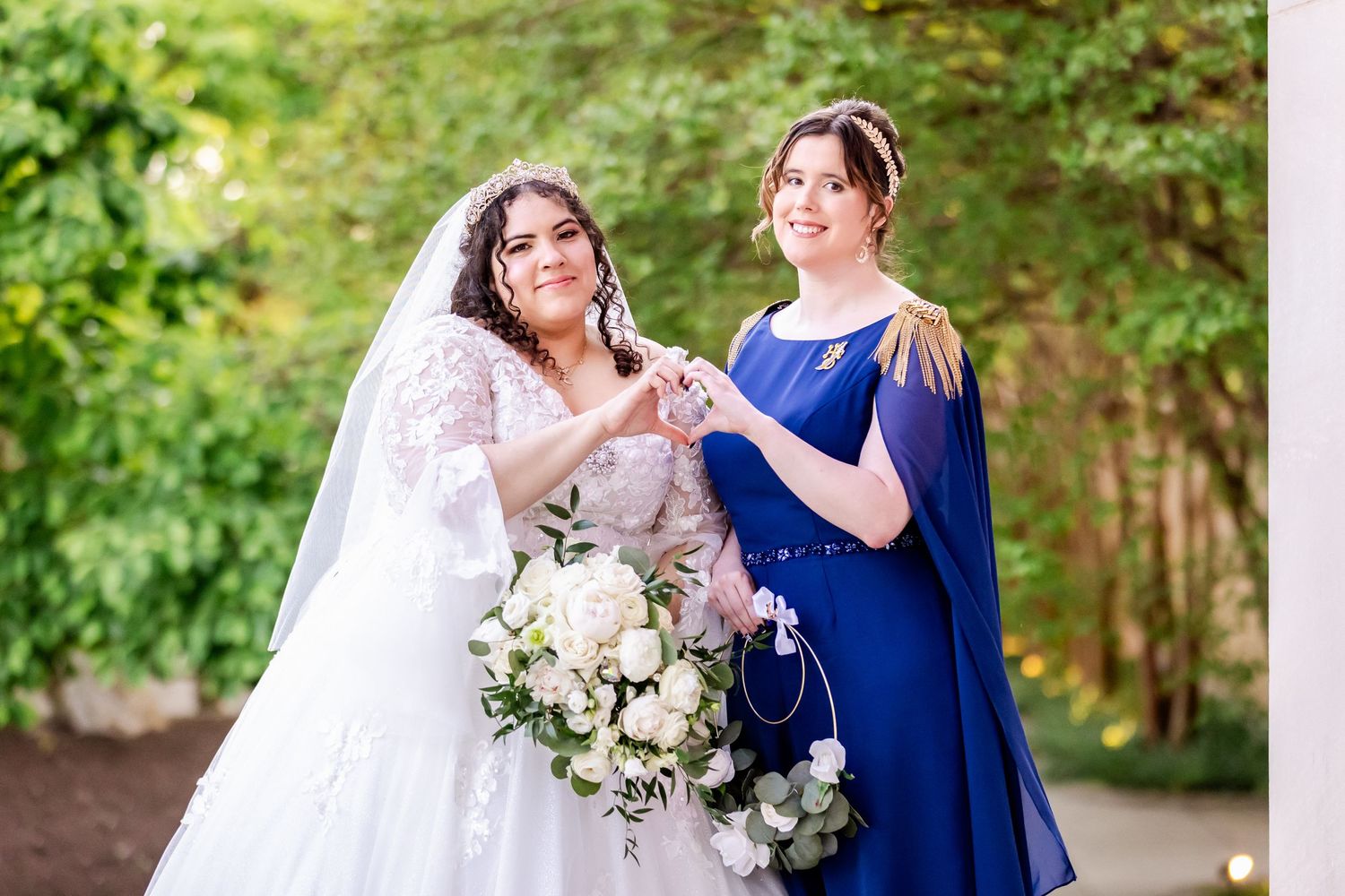 Garden wedding photo with beautiful white floral bouquet.