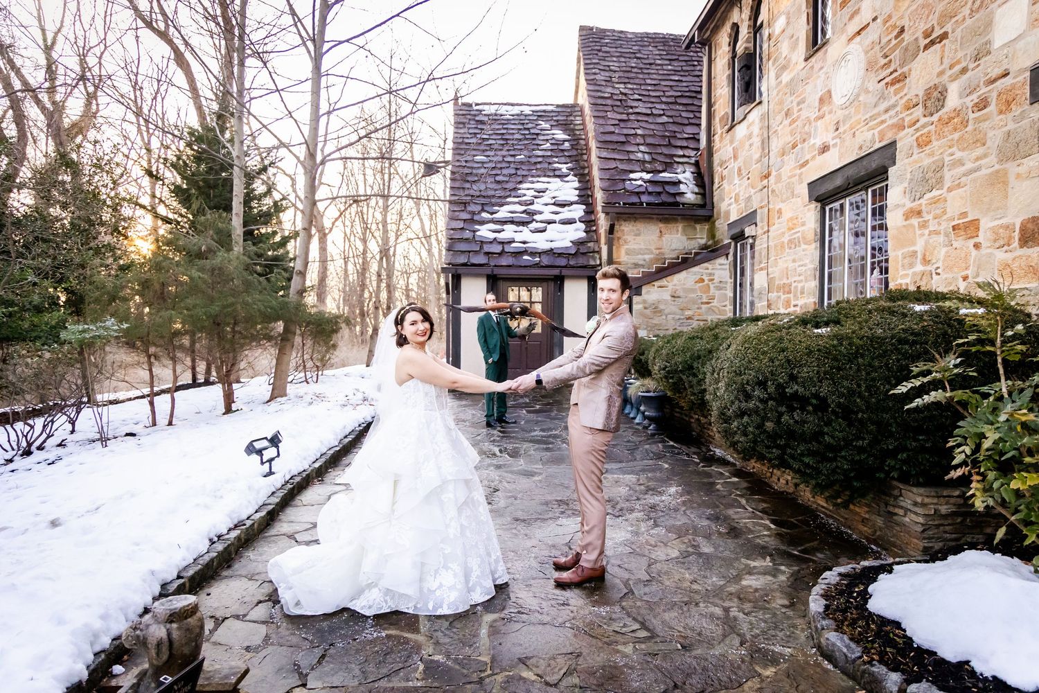 A series of winter wedding photos showing snowy landscapes and stone buildings in a rustic setting.