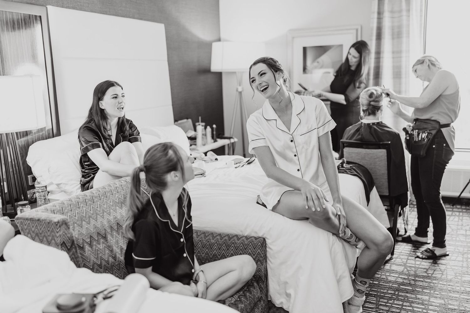 Black and white collage of people in a medical setting showing various healthcare interactions and procedures.