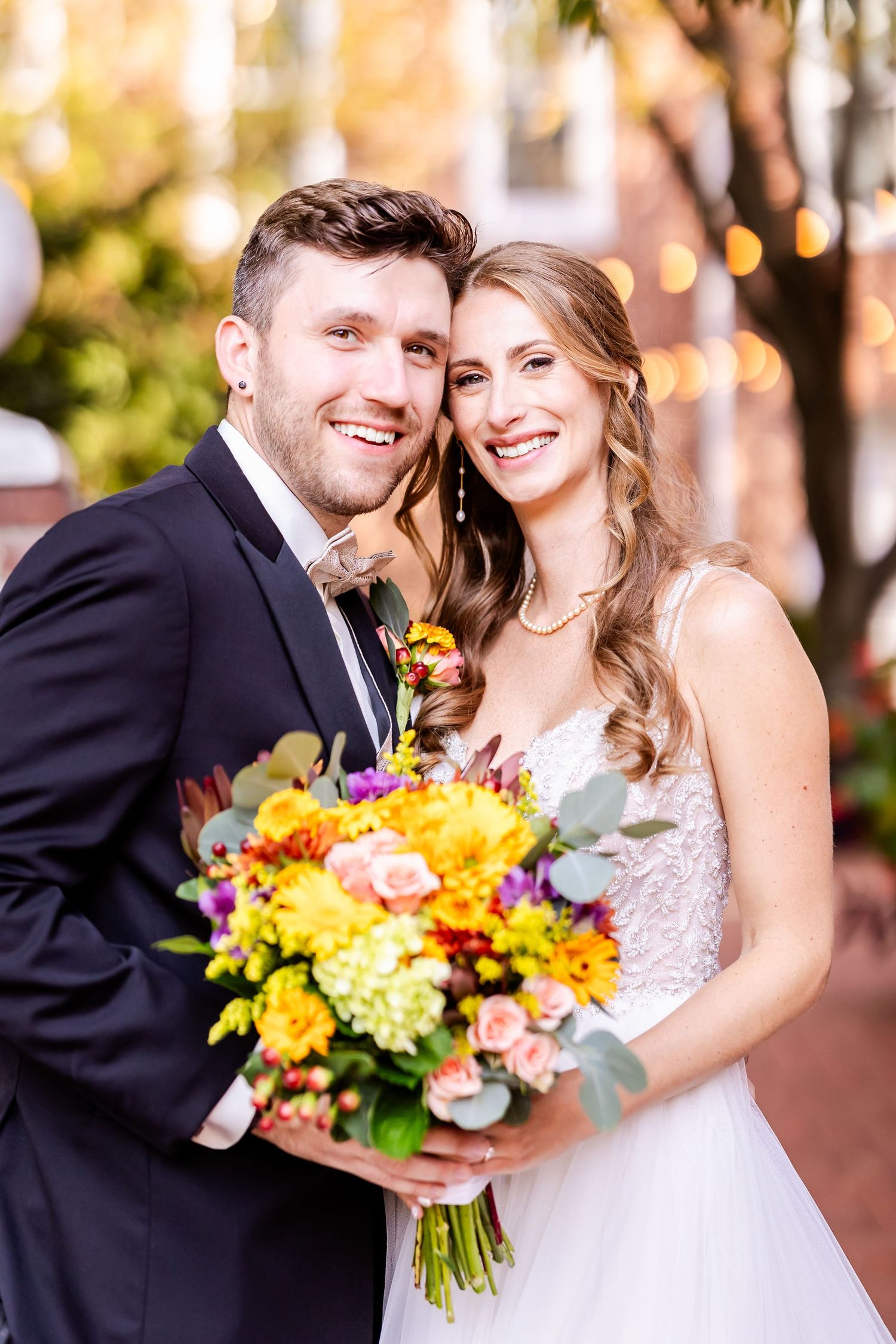 A romantic wedding photo collage featuring colorful yellow and purple bouquets and outdoor evening lighting.