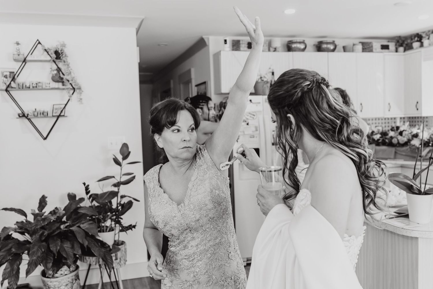 A collage of black and white photographs showing various wedding scenes and bridal preparations.