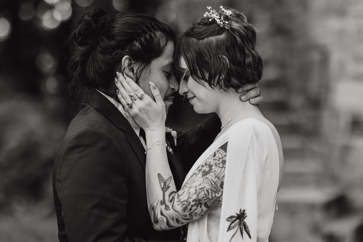 Romantic black and white wedding photo collage showing intimate moments between newlyweds.