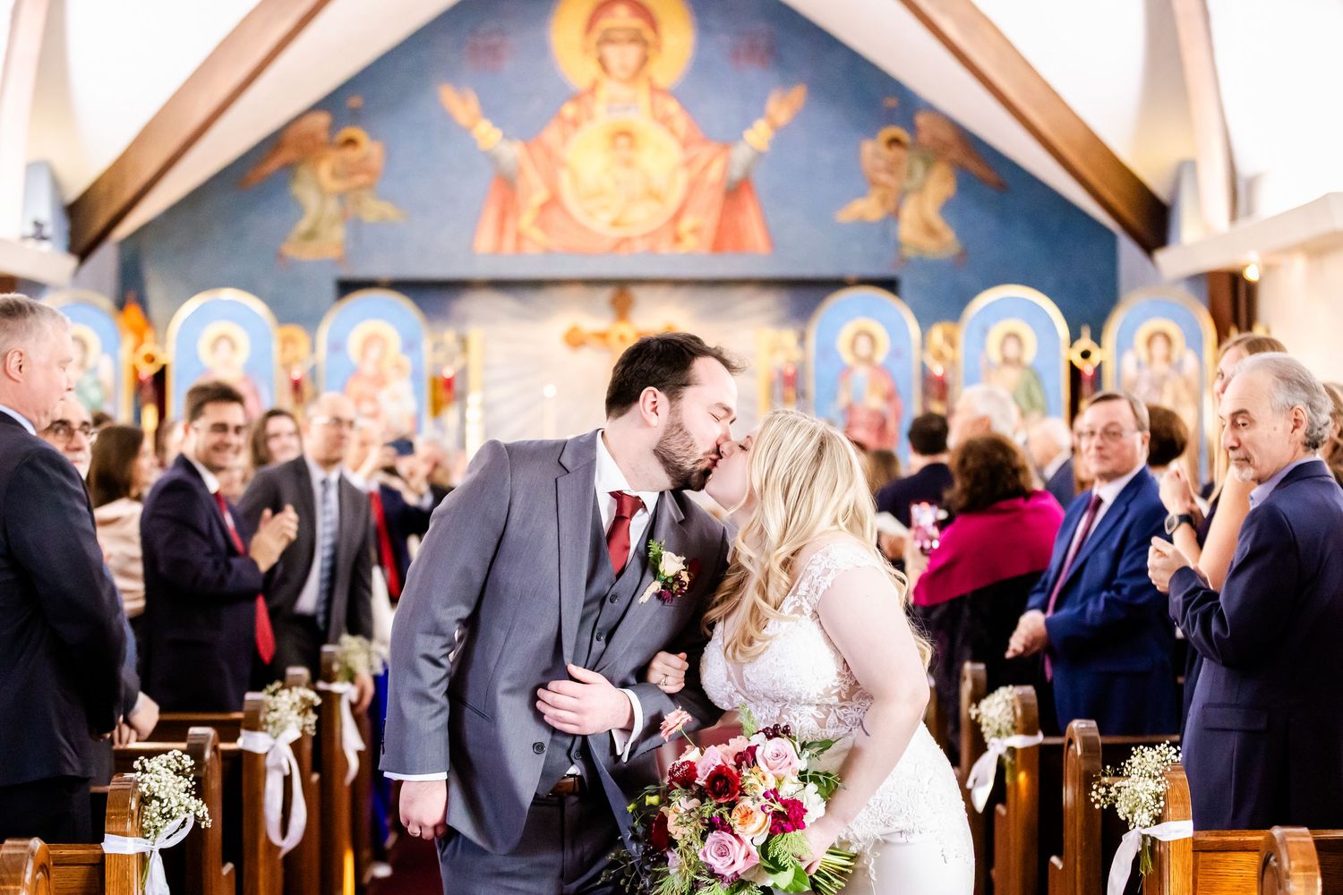 Wedding ceremony and reception scenes inside an ornate church with golden religious iconography and decorative elements.