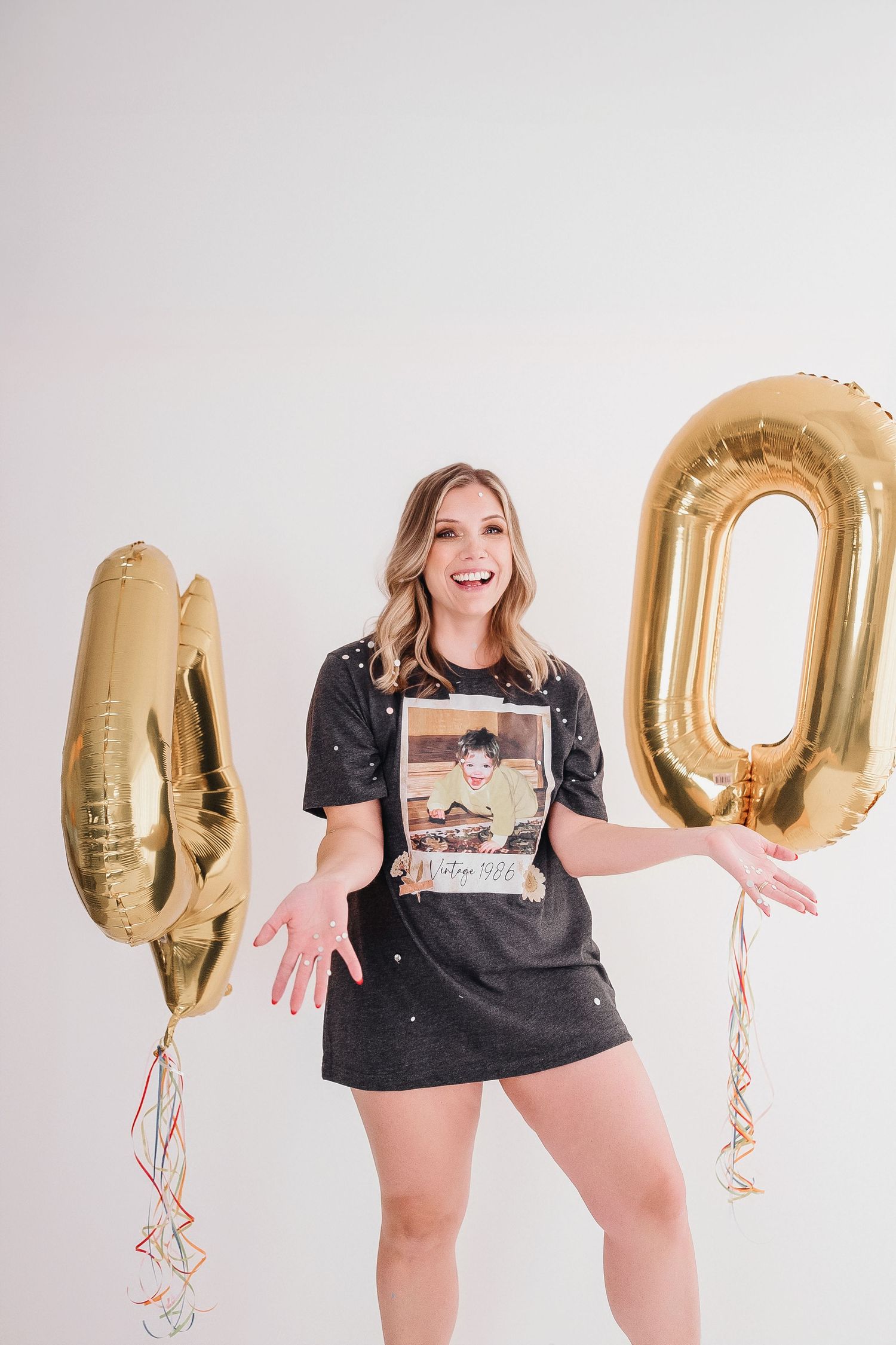 Fun birthday photo series with gold number balloons and expressive poses.