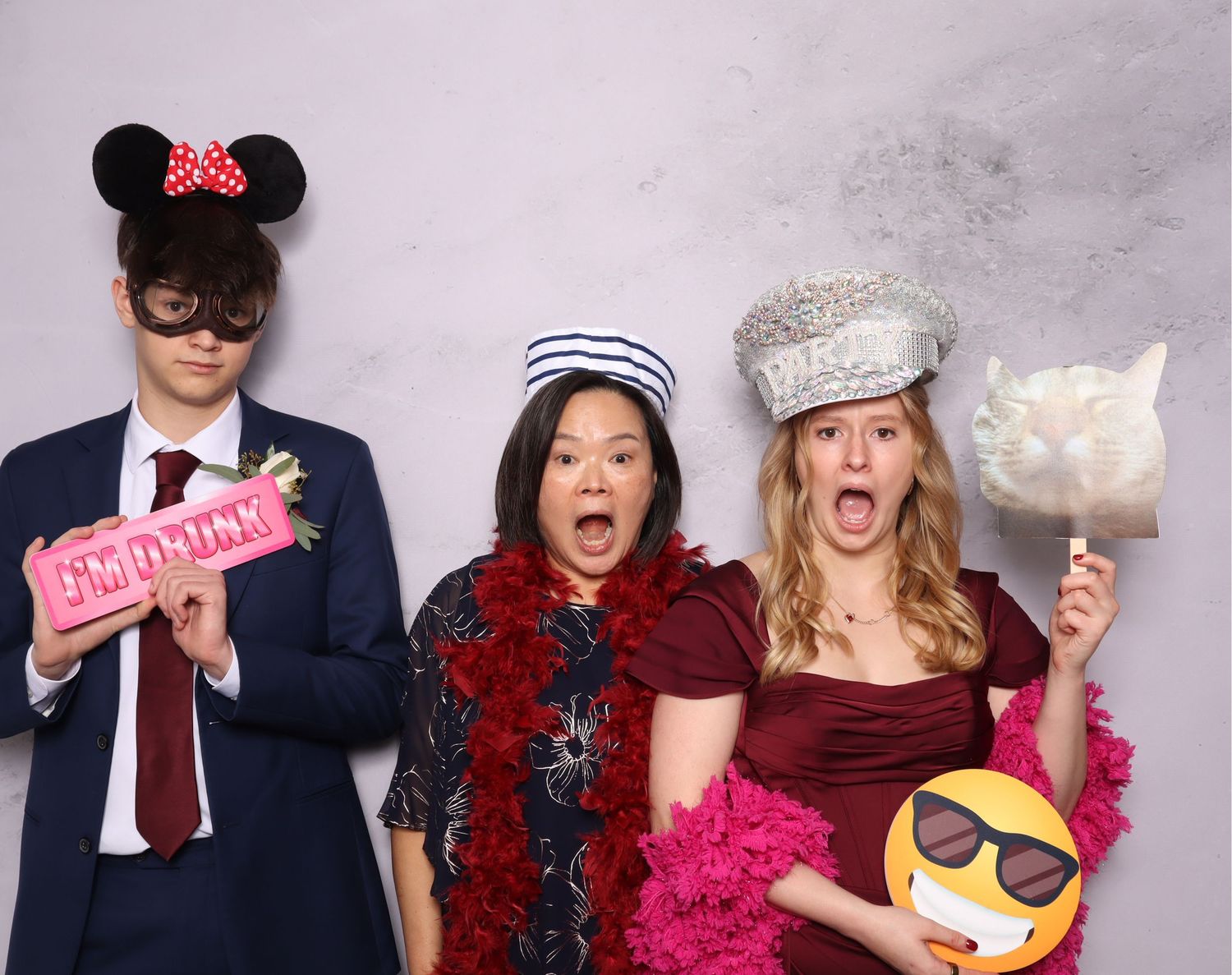 A collage of photo booth style party pictures showing people posing with props like sunglasses and Mickey Mouse ears.