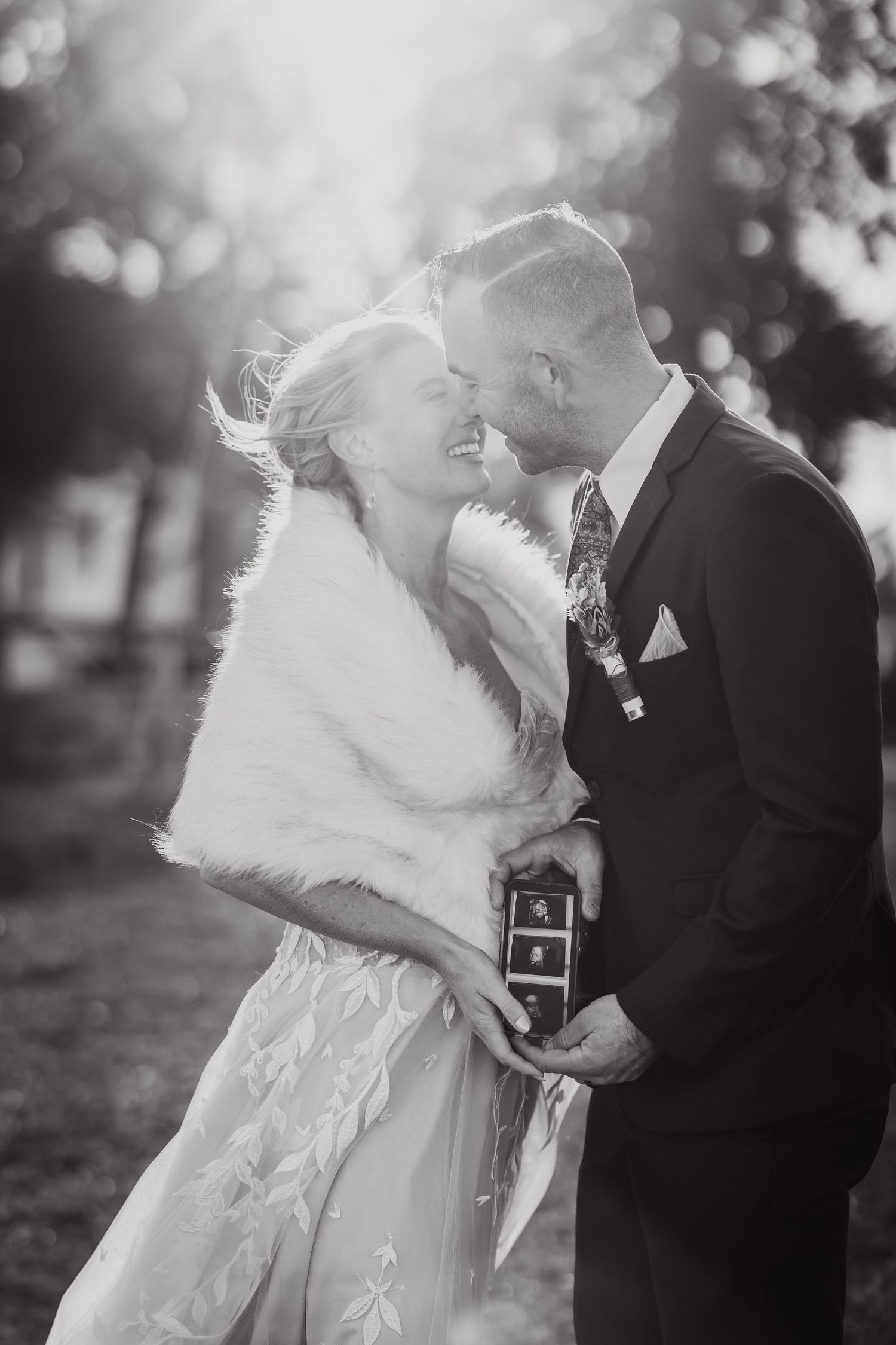 A romantic black and white wedding photo series showing tender moments between a bride in a white dress and groom in a suit.