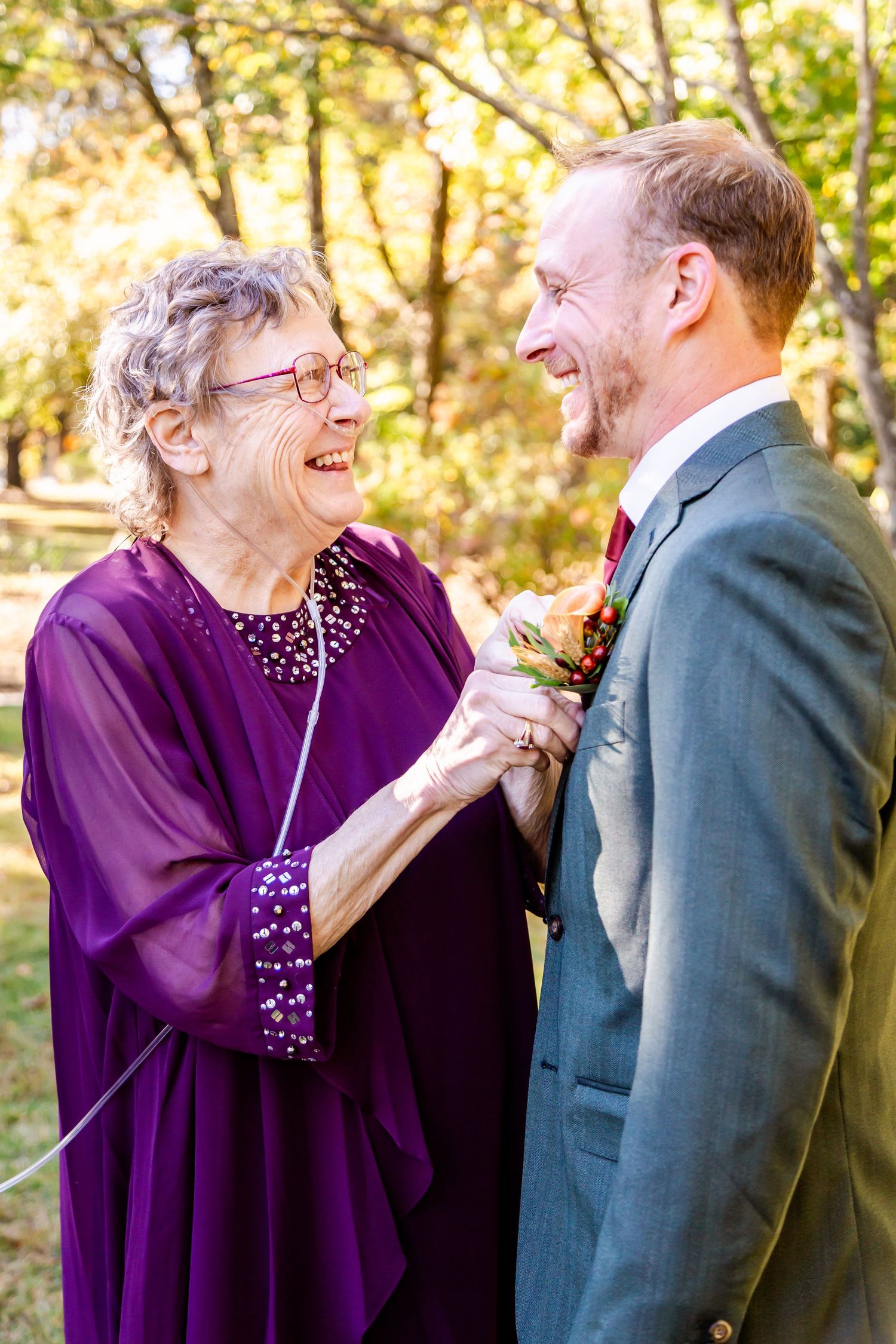 A heartwarming sequence of candid moments between two people sharing laughter in an outdoor autumn setting.