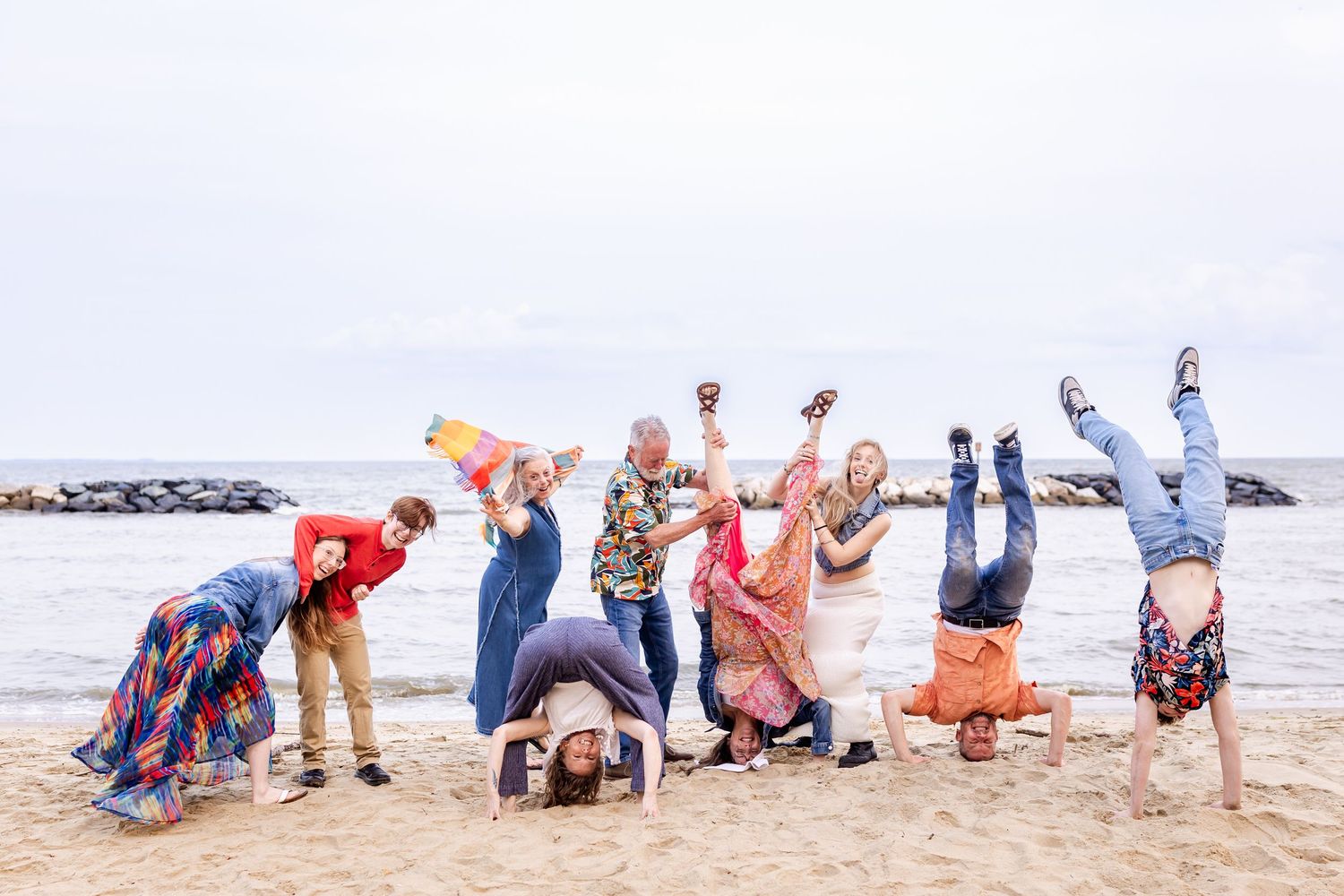 Fun beach photo sequence showing group bending down in synchronized poses.