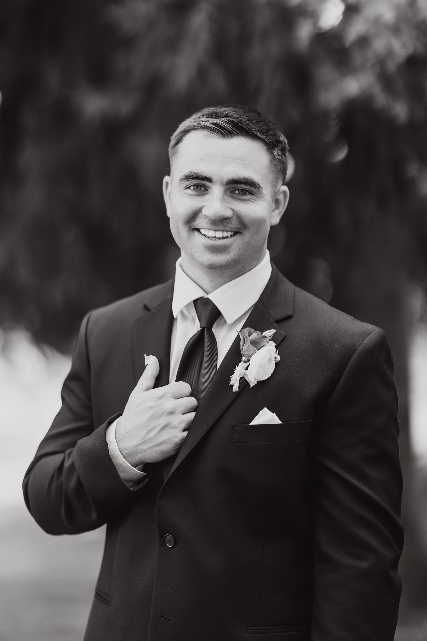 Black and white portraits showing joyful expressions in formal wedding attire.