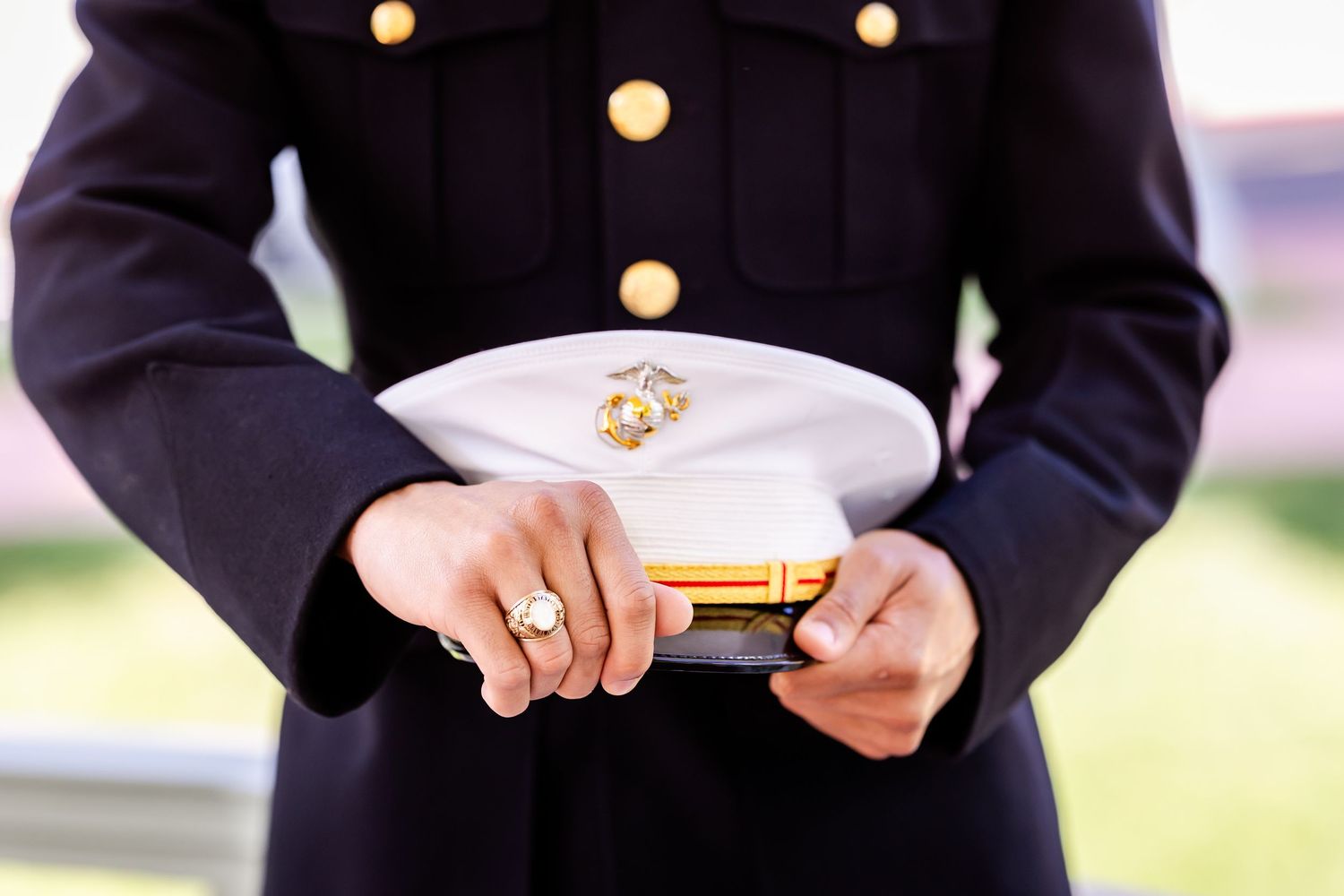 Close-up of military dress uniform details and medals.