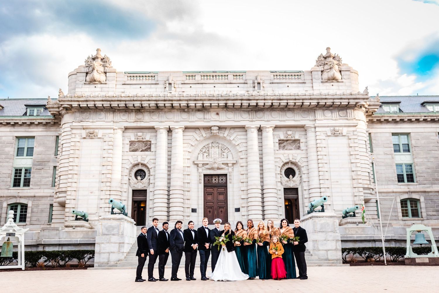 Panoramic view of historic grand white mansion with ornate architectural details and elegant classical colonnade details.