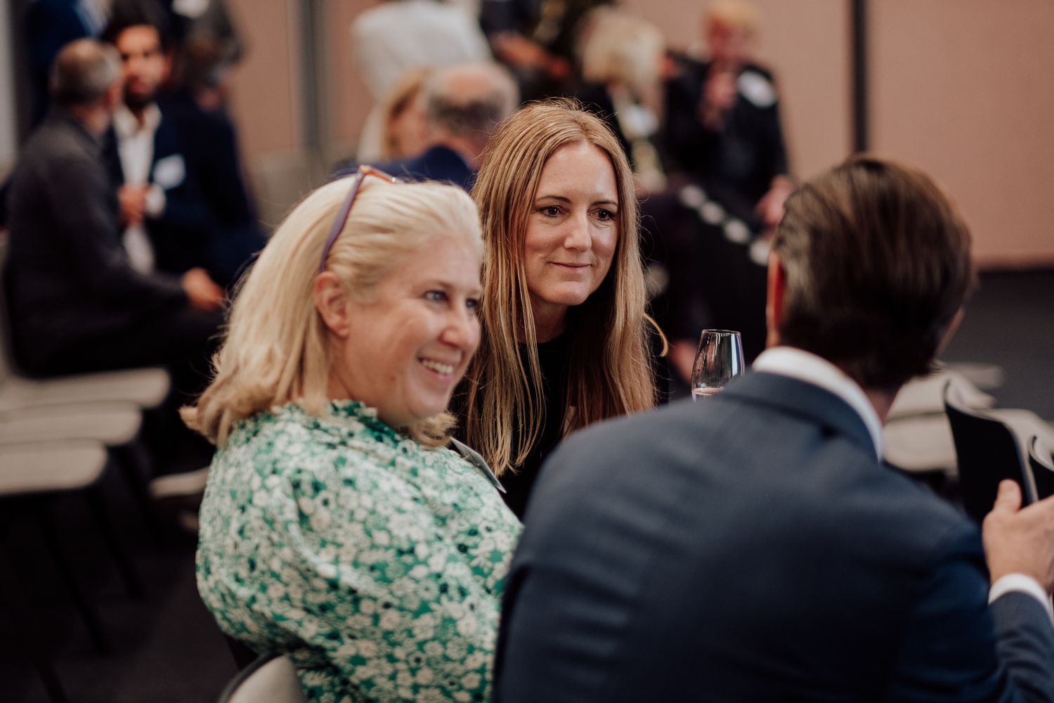 charity event photography in London – guests mingling and celebrating together