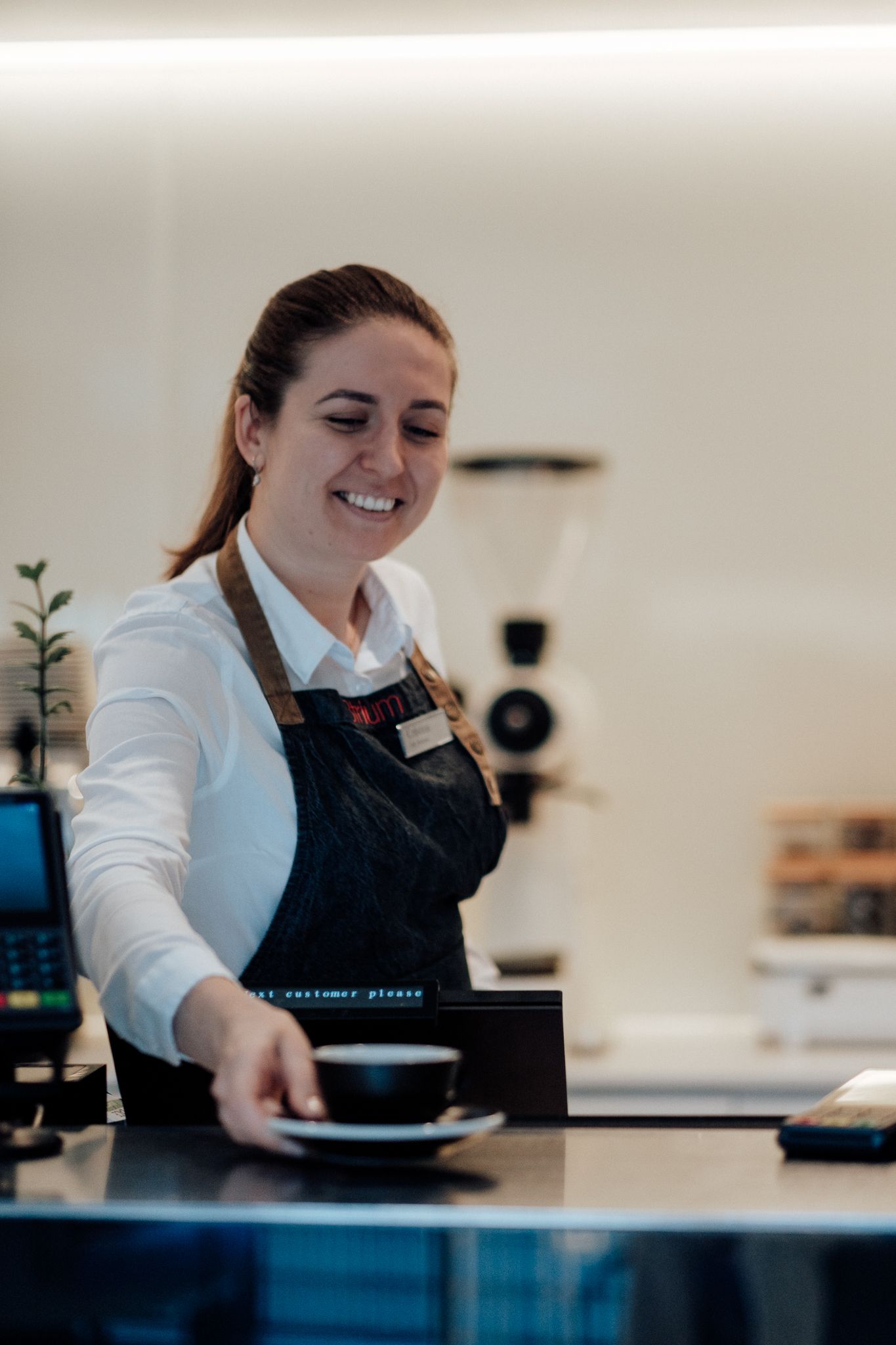 café branding photography in London – coffee being served in ceramic cup